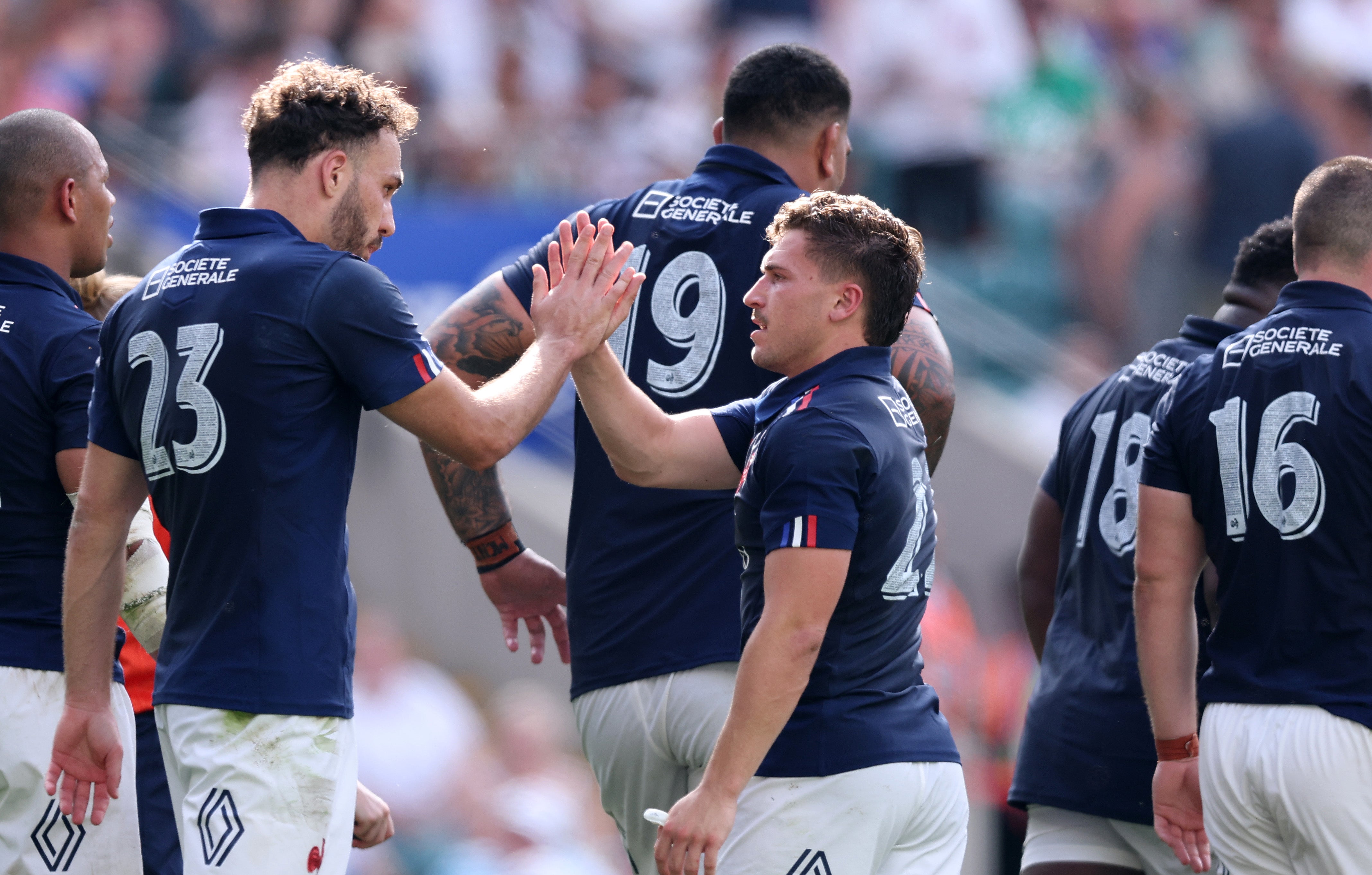 France celebrated victory despite Cameron Woki’s red card