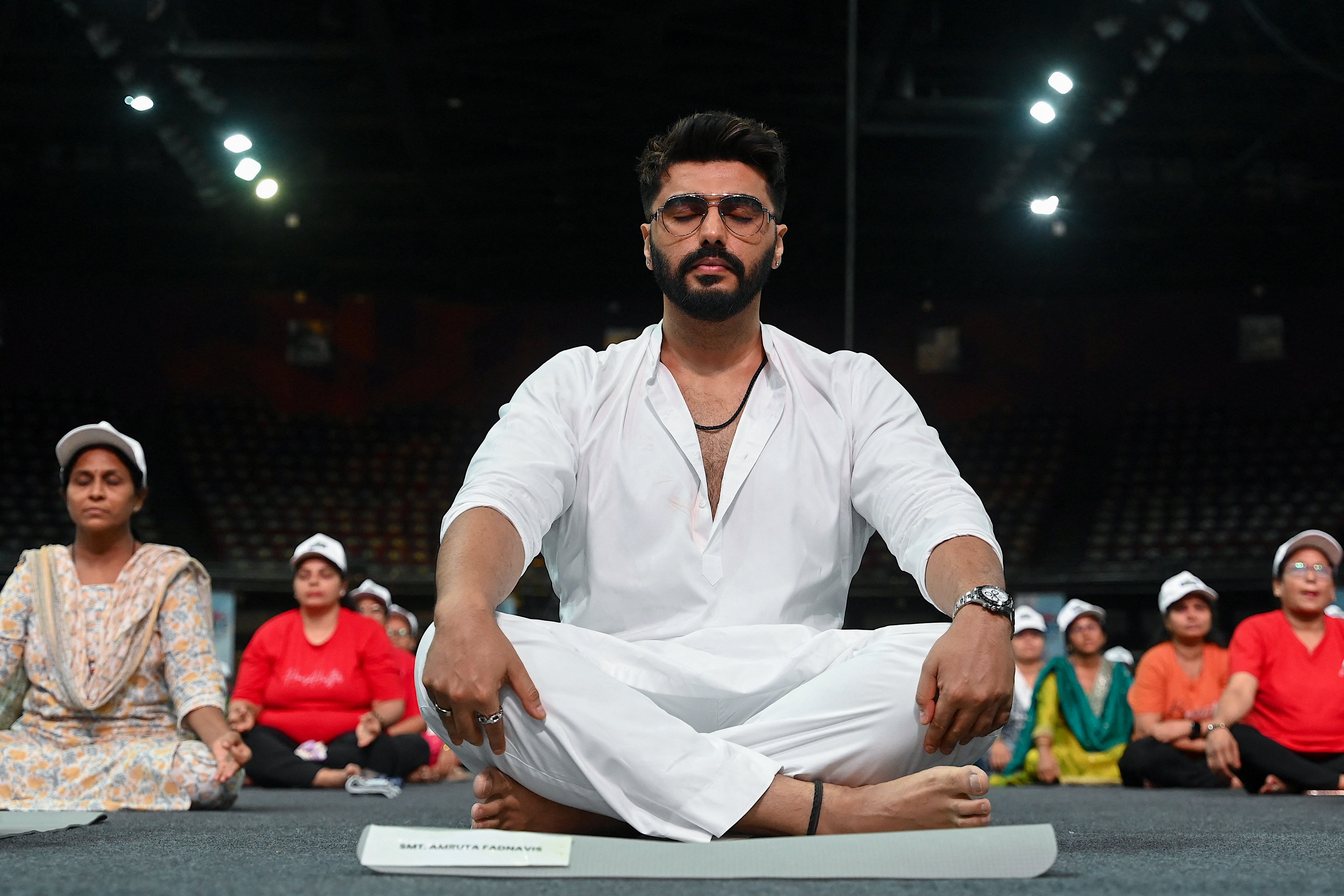 Bollywood actor Arjun Kapoor takes part in a yoga session in Mumbai