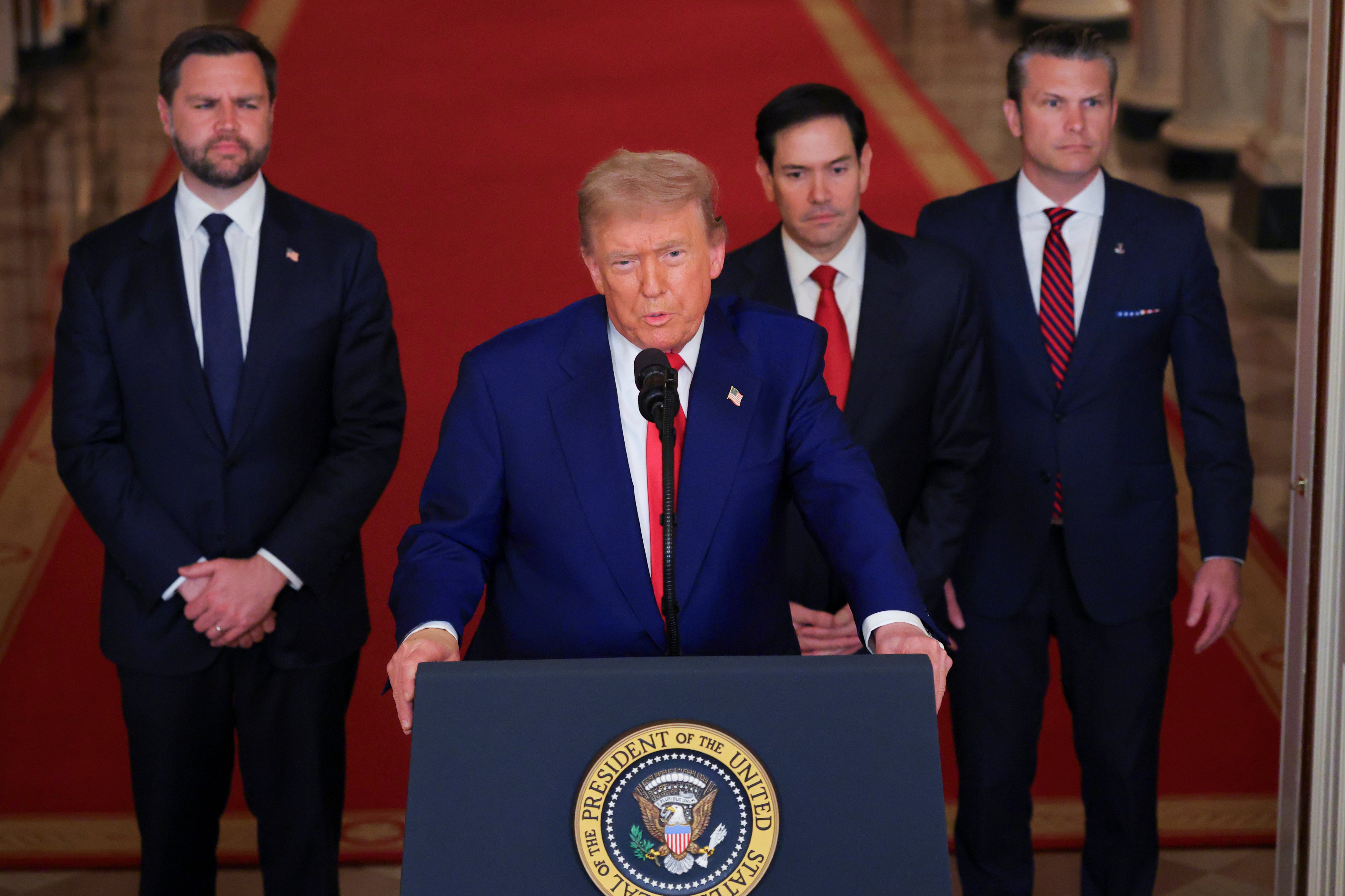 President Donald Trump speaks from the East Room of the White House in Washington, Saturday, June 21, 2025, after the U.S. military struck three Iranian nuclear and military sites, as Vice President JD Vance, Secretary of State Marco Rubio and Defense Secretary Pete Hegseth listen.