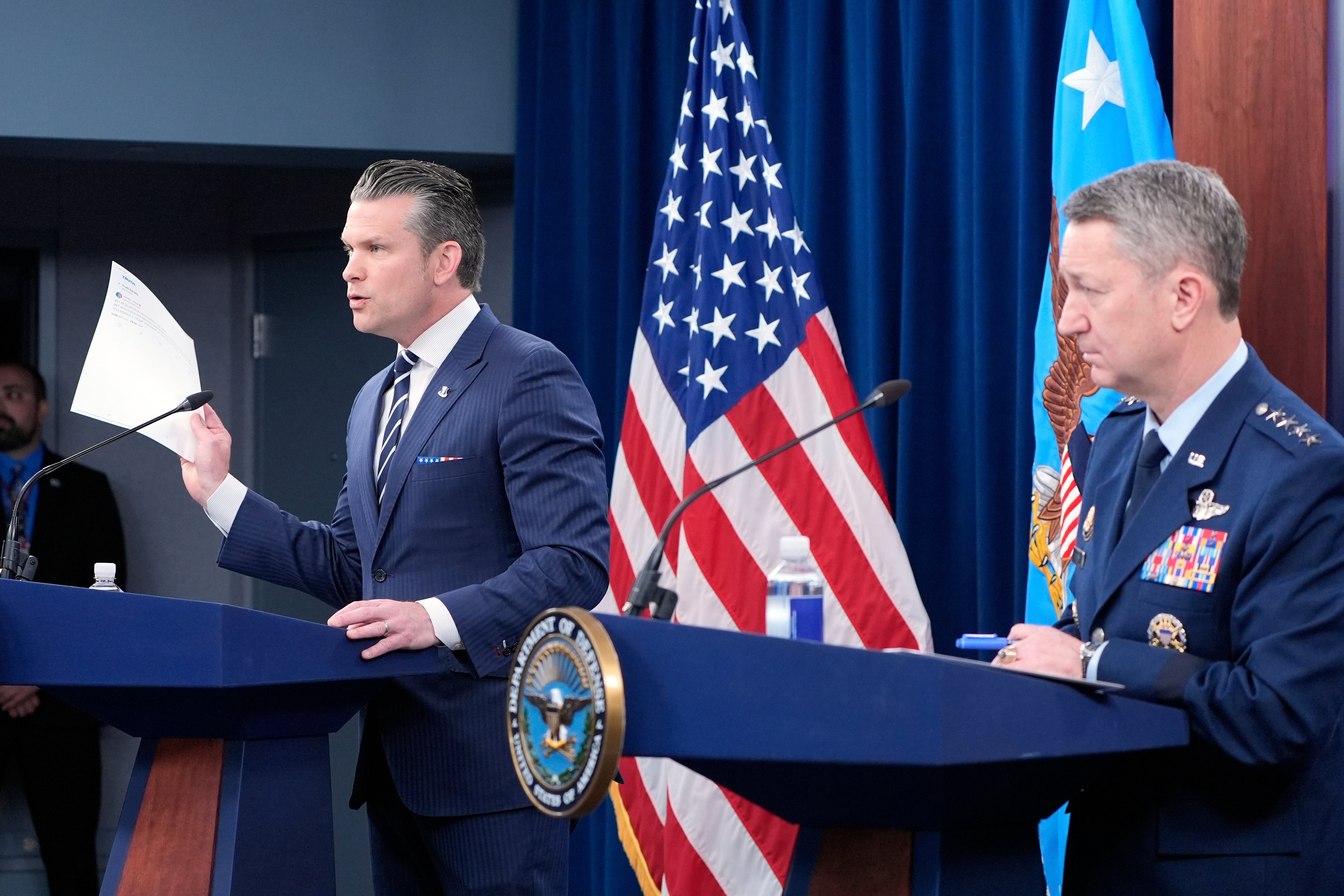 Defense Secretary Pete Hegseth and Joint Chiefs Chairman Gen. Dan Caine speak during a news conference at the Pentagon after the U.S. military struck three sites in Iran