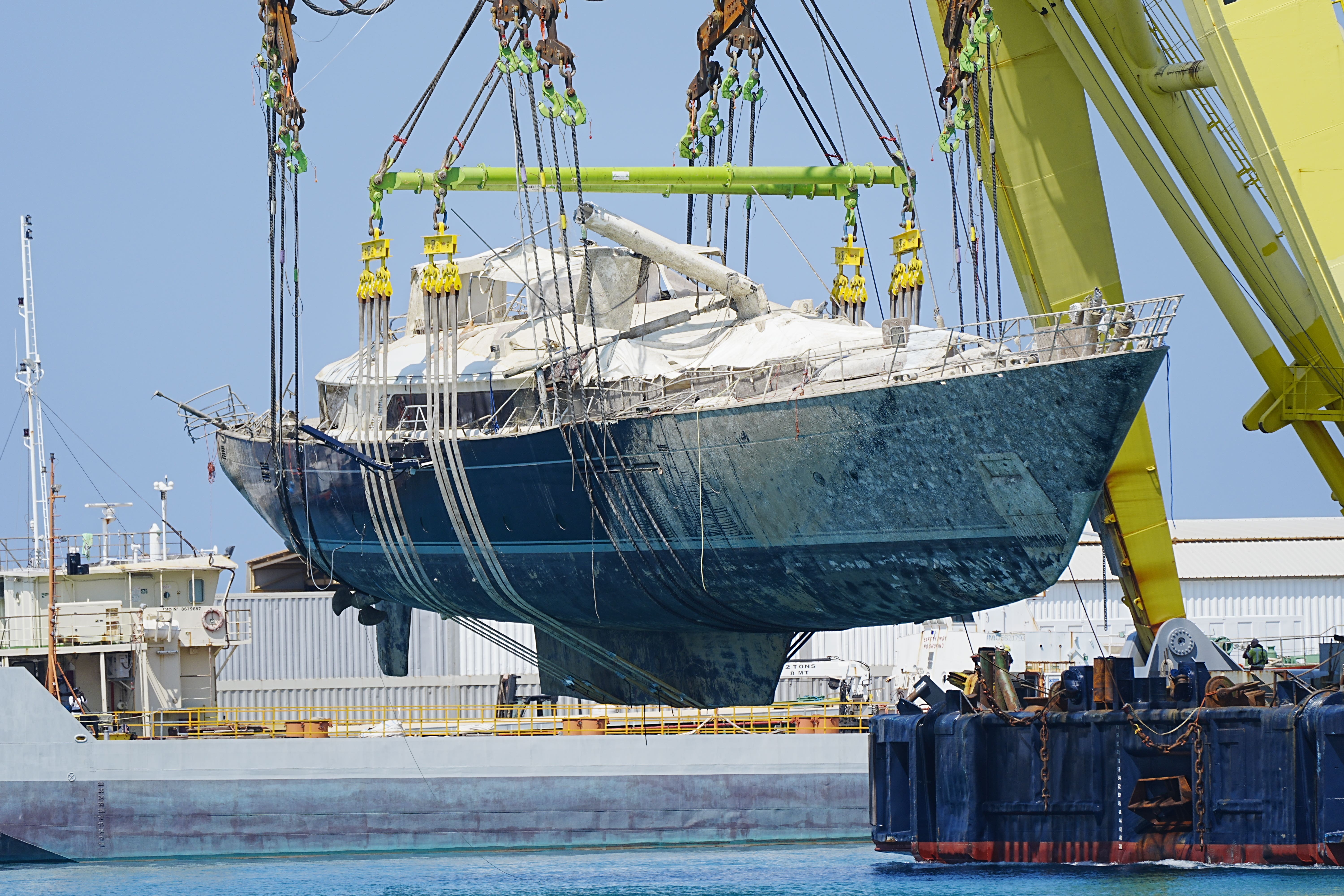The Bayesian is moved after being lifted to the surface near the fishing town of Porticello, Sicily (Peter Byrne/PA)