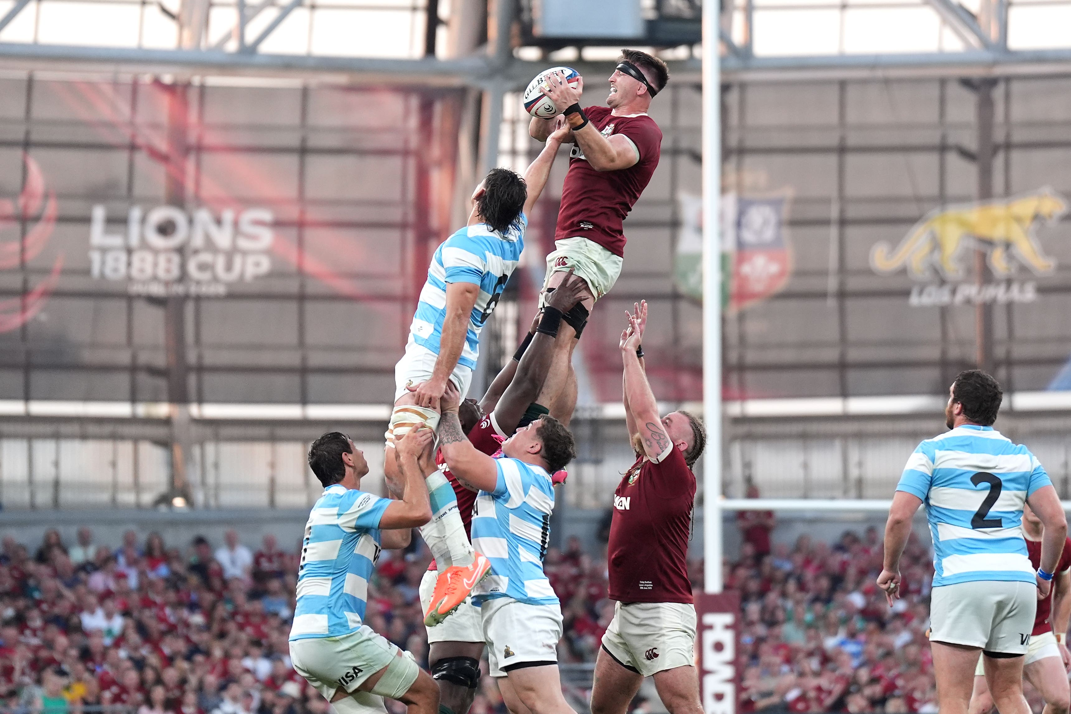 British and Irish Lions’ Tom Curry claims the ball in a line-out (Niall Carson/PA)