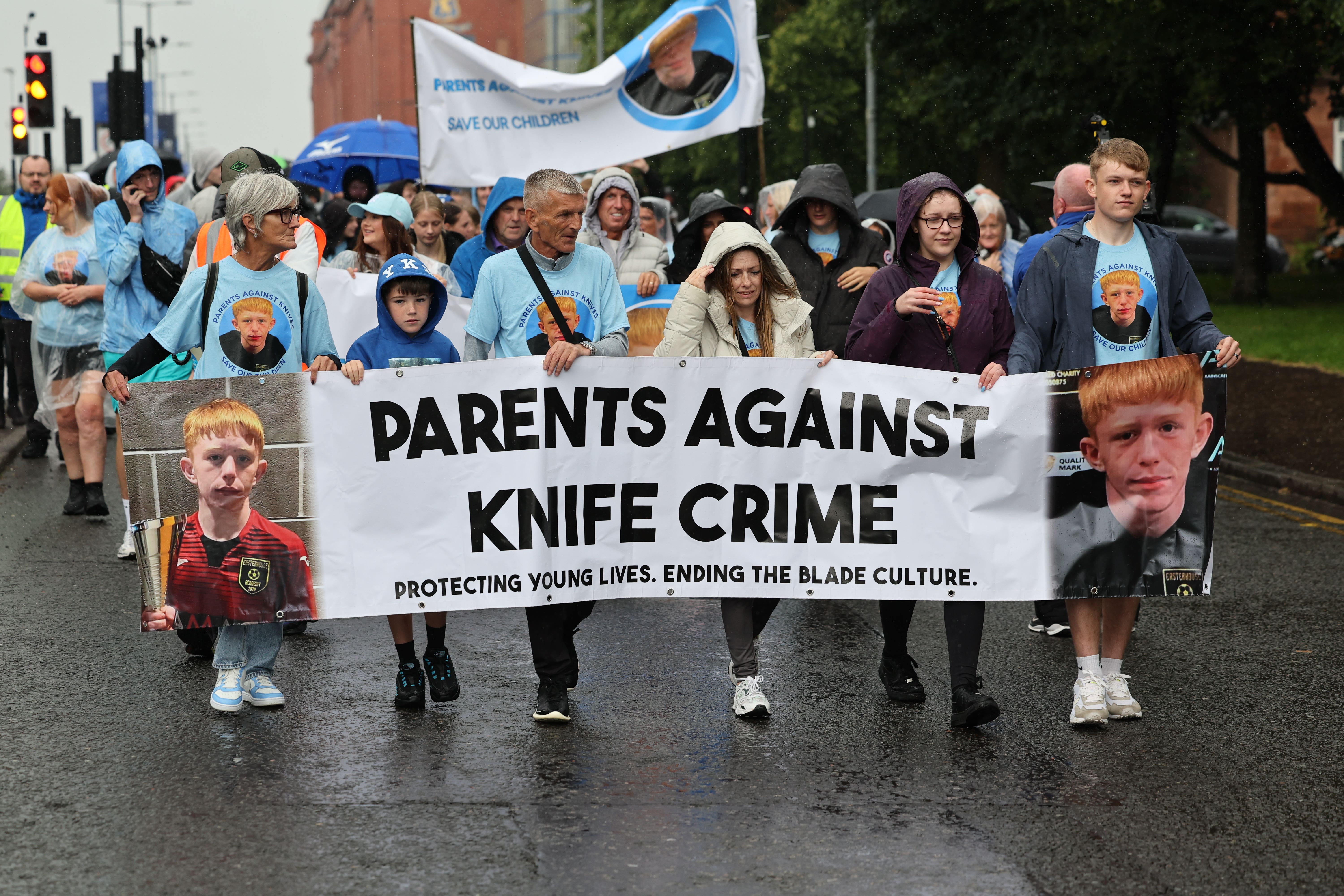 People taking part in a Parents Against Knives walk from Ibrox stadium to Parkhead in Glasgow (Robert Perry/PA)