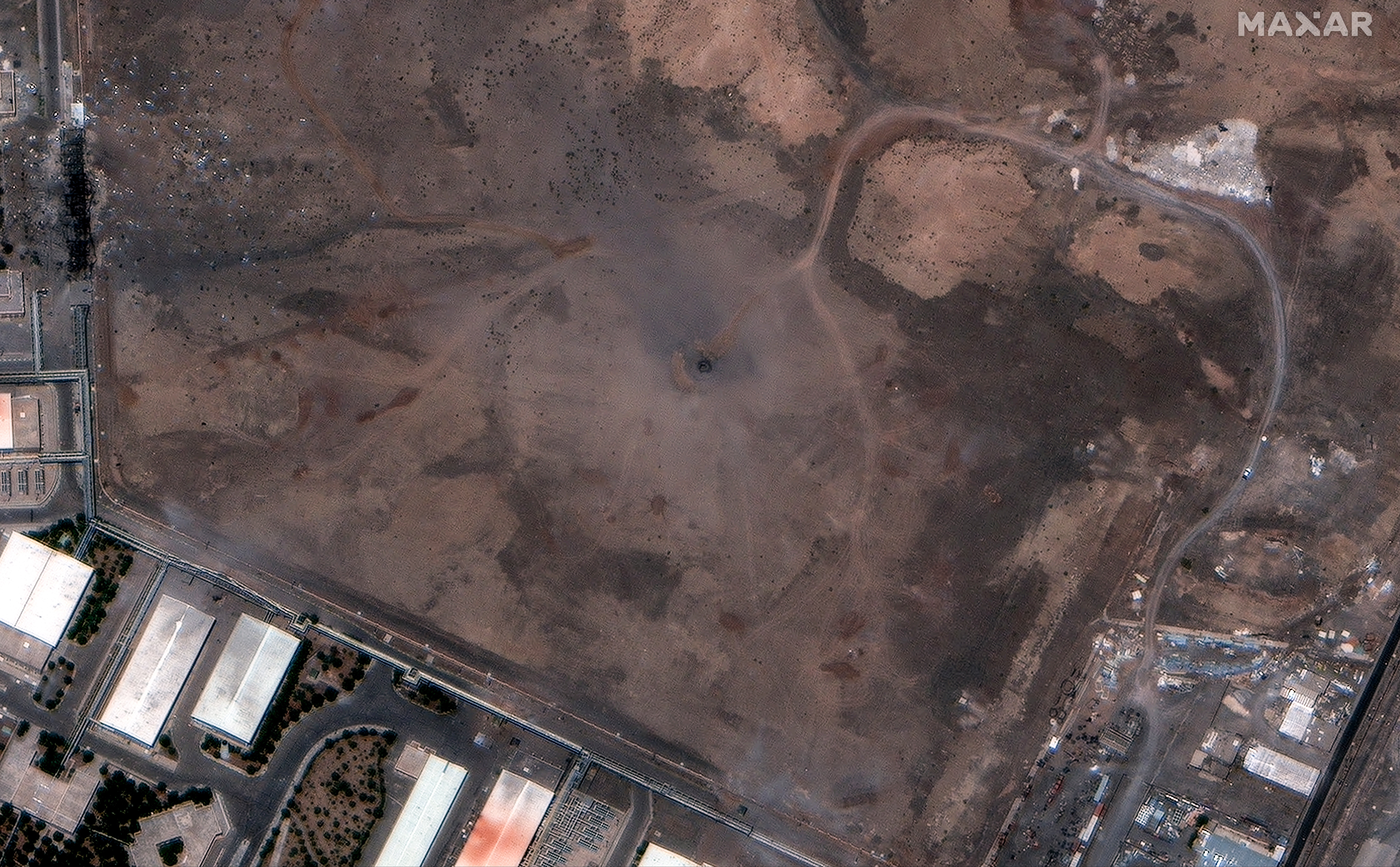 A crater over the underground facility of the Natanz nuclear enrichment facility after US airstrikes, in Natanz