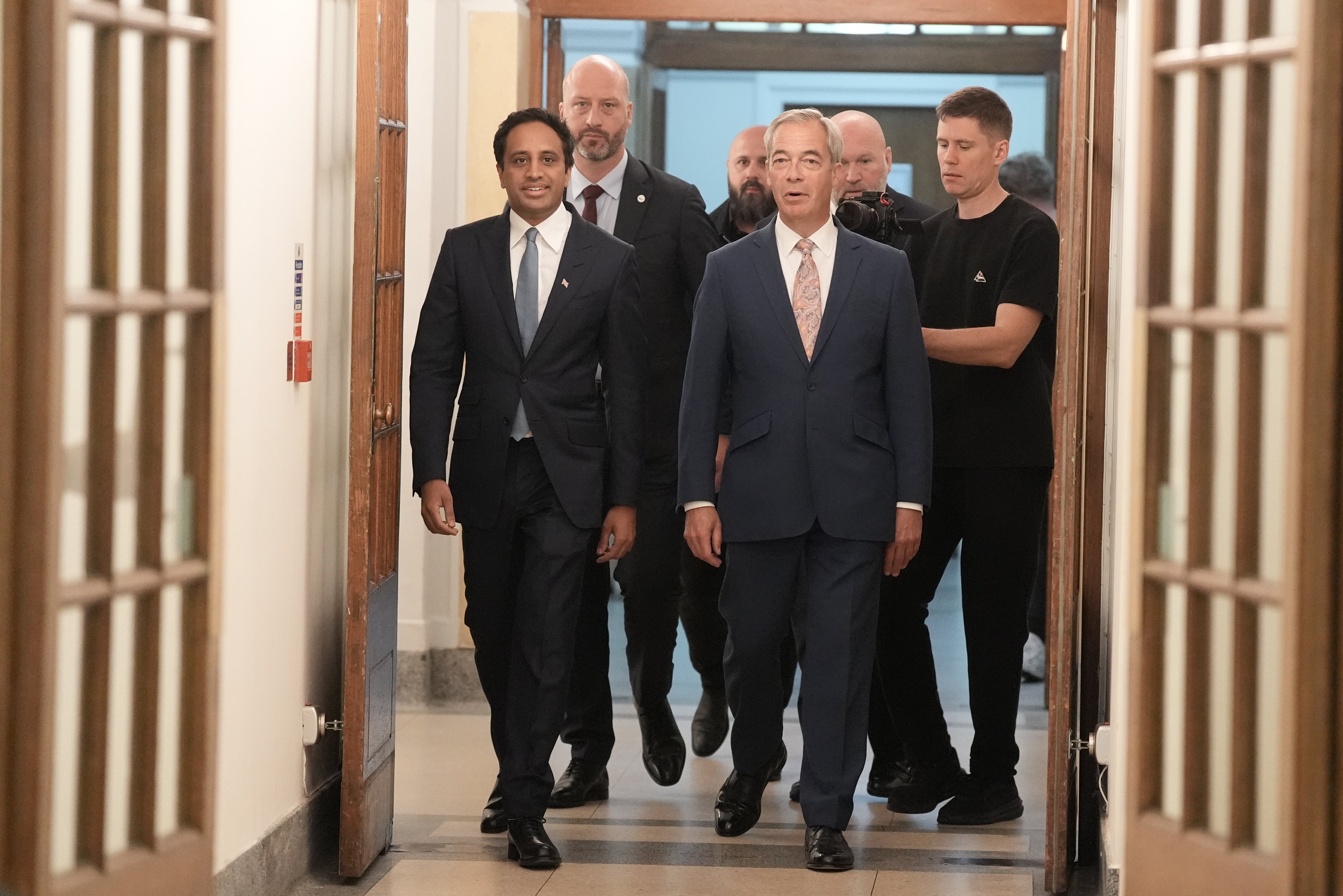 Farage and Yusuf arrive to introduce their plans