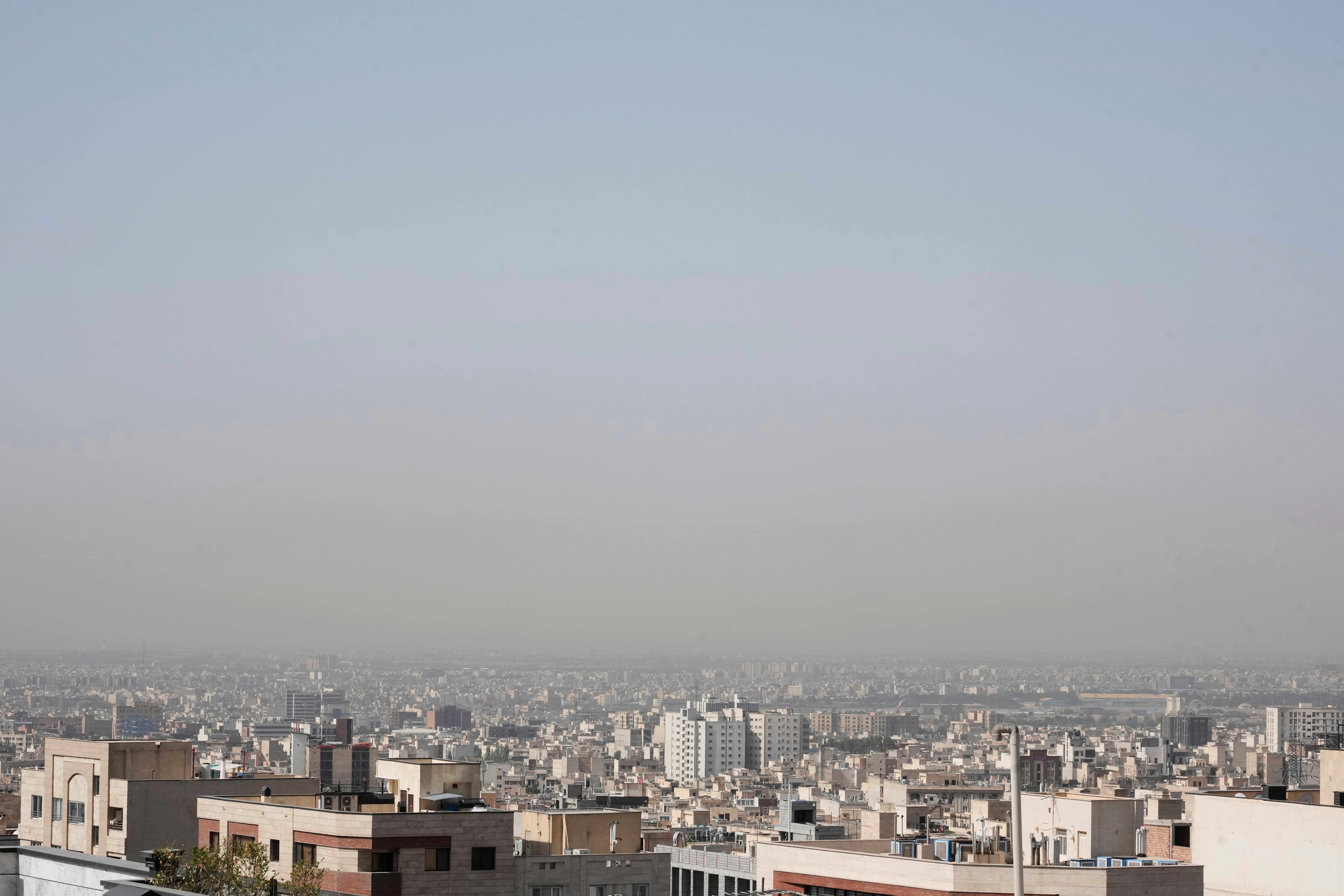 The Tehran skyline on Tuesday morning as the ceasefire went into effect (Vahid Salemi/AP)