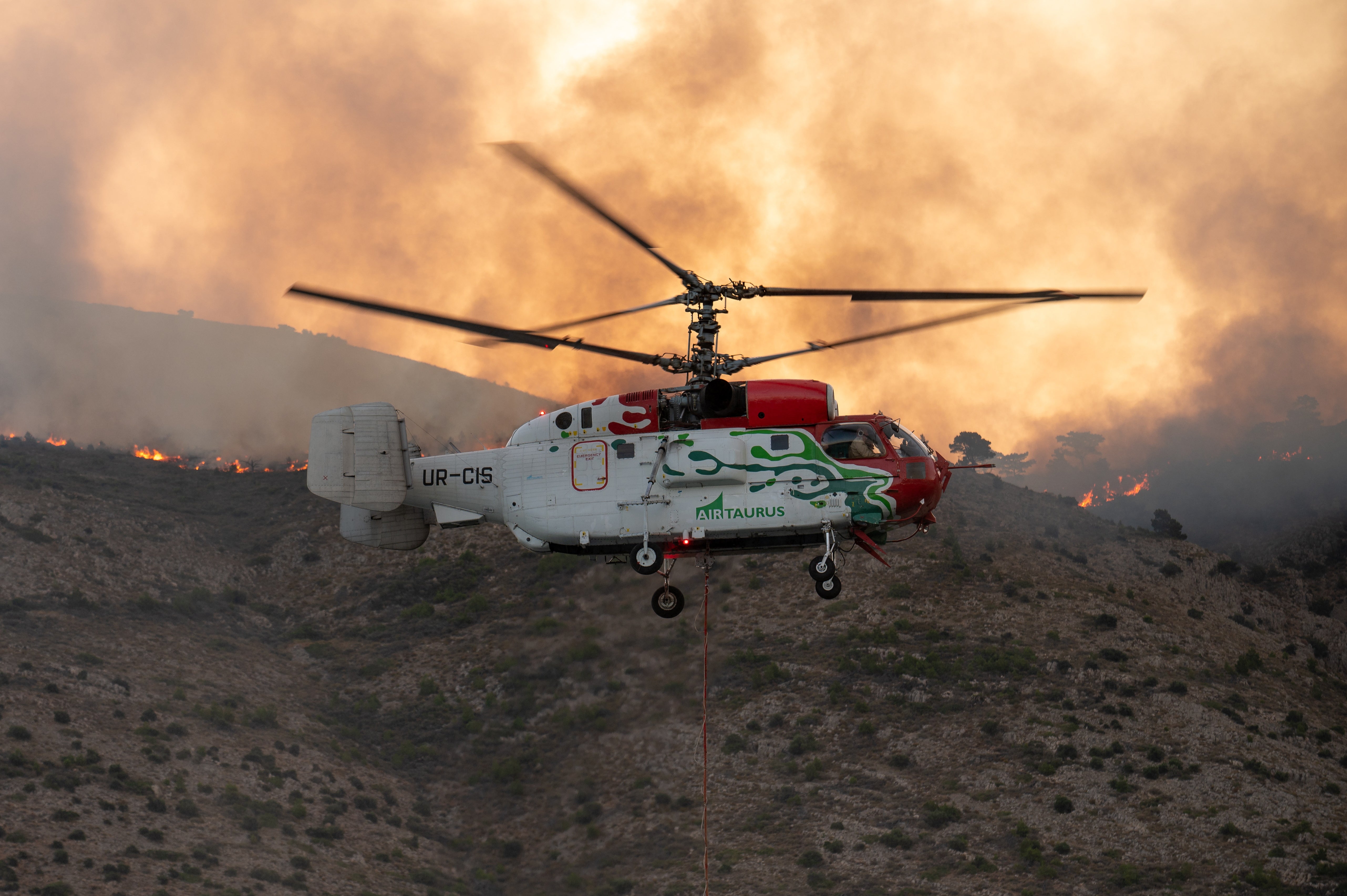 A firefighting helicopter during firefighting operations on Chios Island