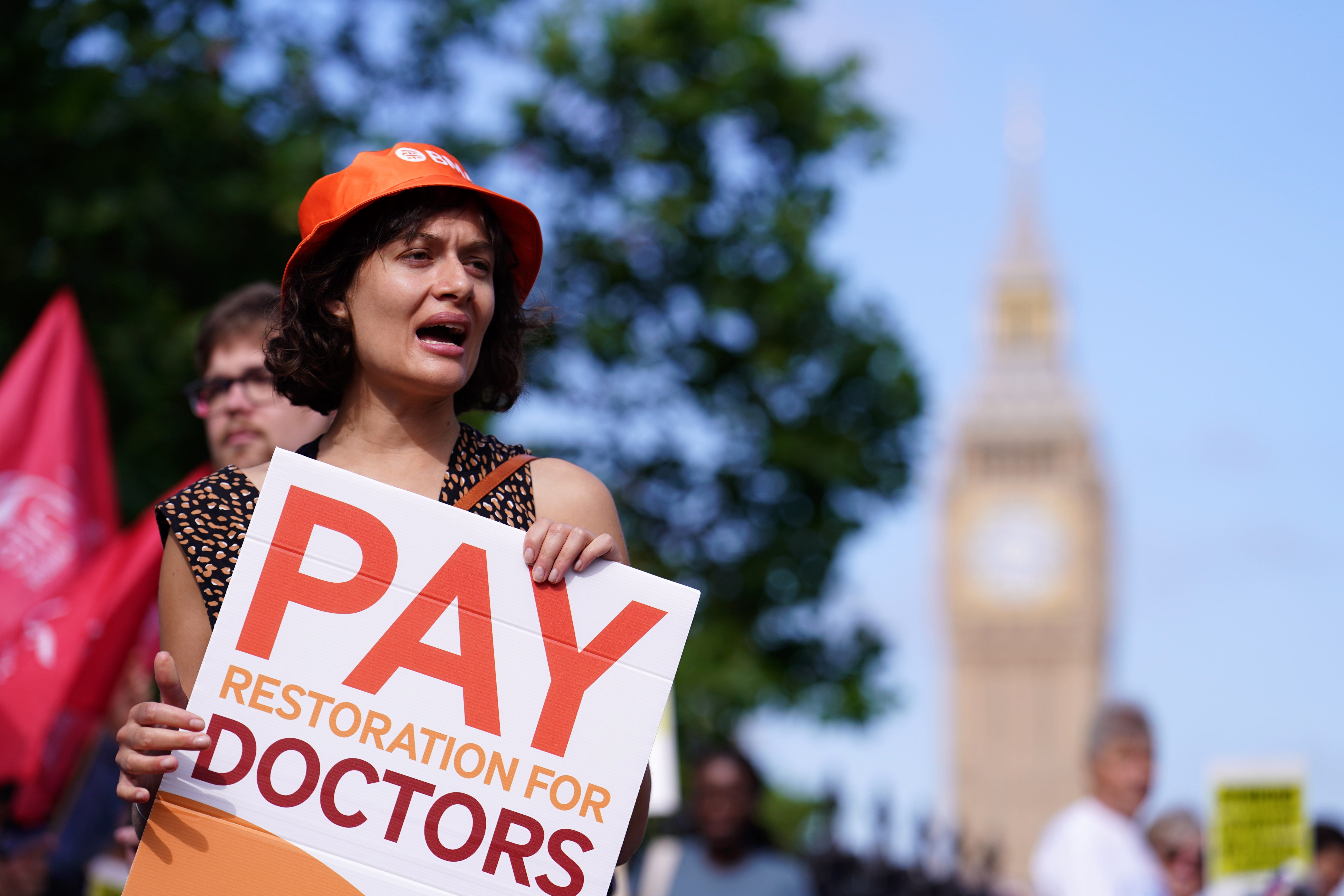 A junior doctor on the picket line outside St Thomas’ Hospital, London, during their continuing dispute over pay (Jordan Pettitt/PA)