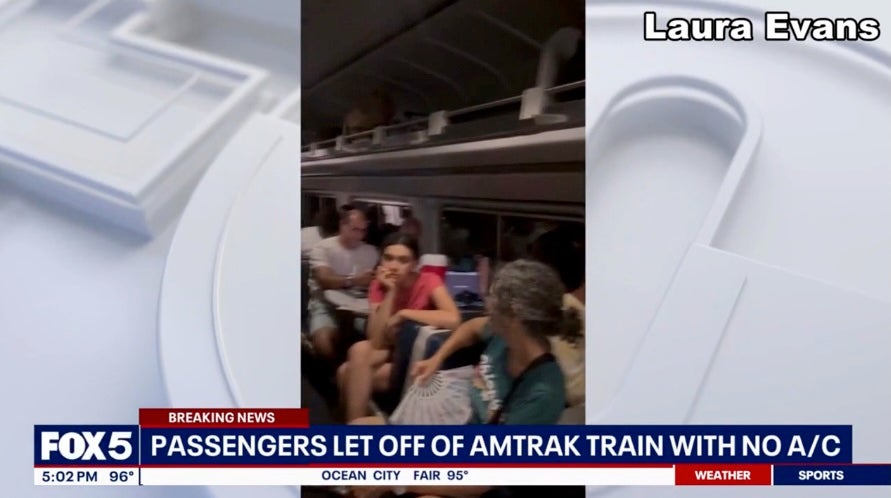 Amtrak passengers were filmed sweltering on a train stuck in a Baltimore tunnel for over an hour during heatwaves that have hit the East Coast