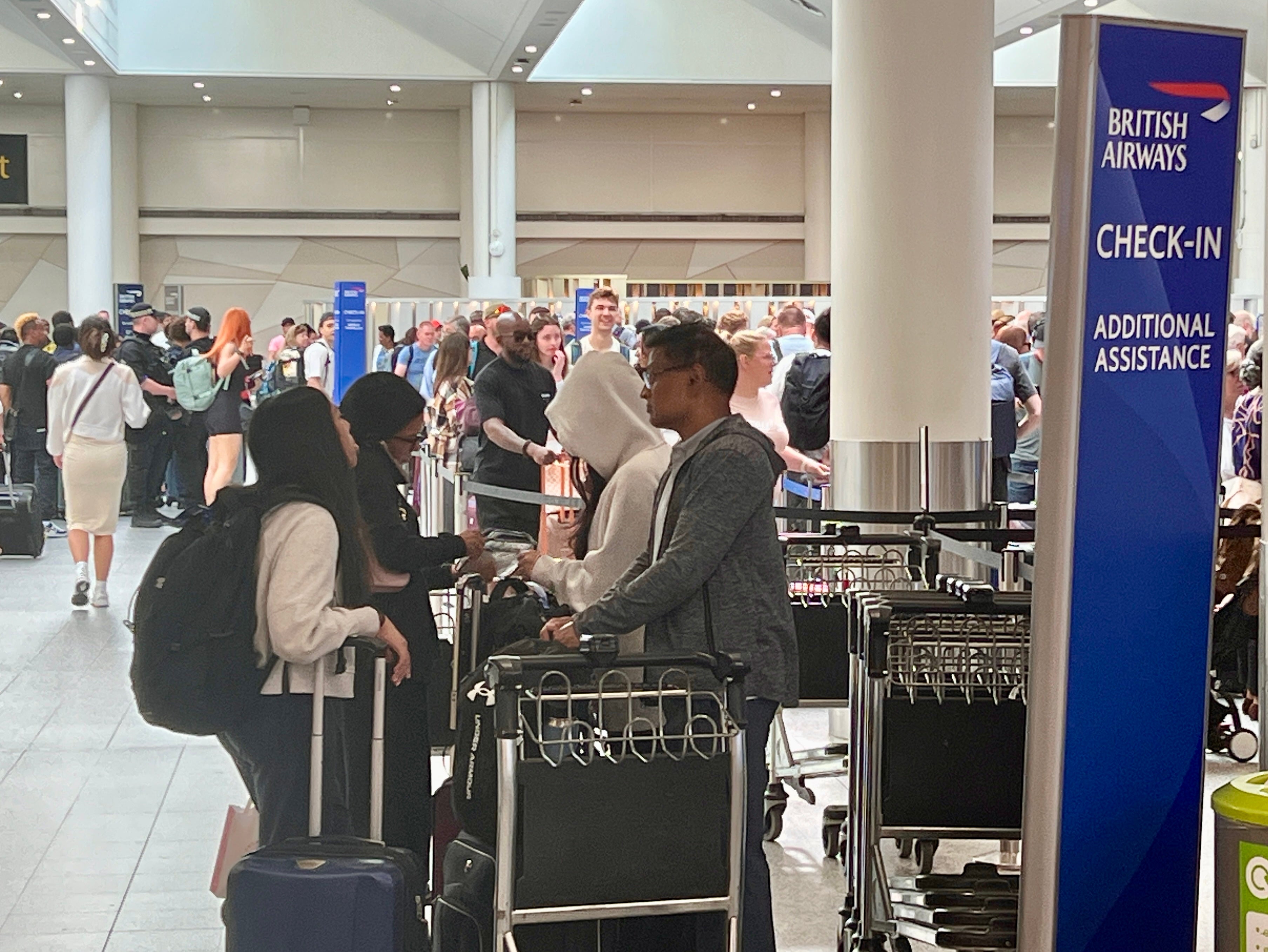 Waiting game: Passengers at London Gatwick on Sunday morning 22 June
