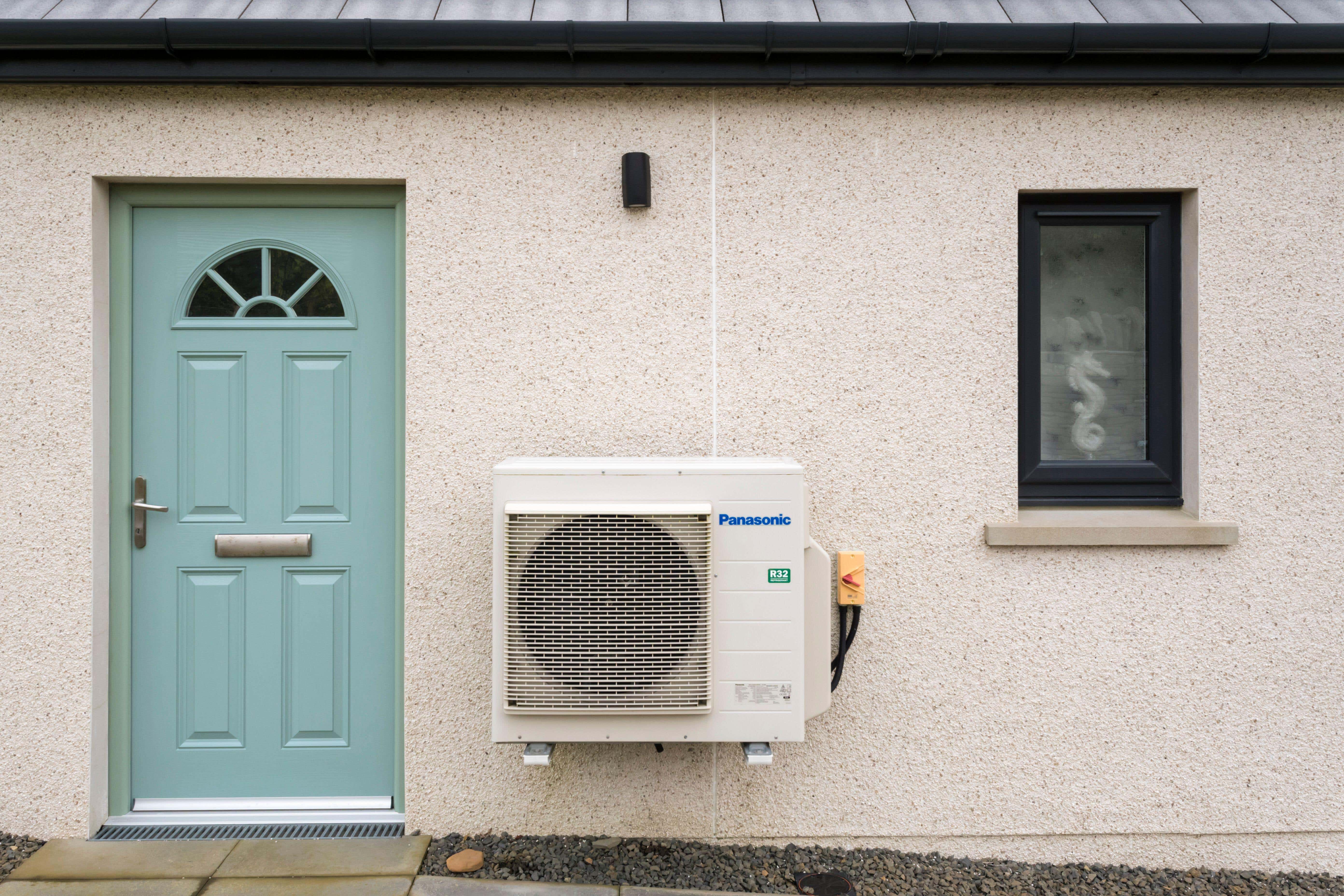 At the moment a household with a heat pump pays £490 a year on policy costs alone (Alamy/PA)