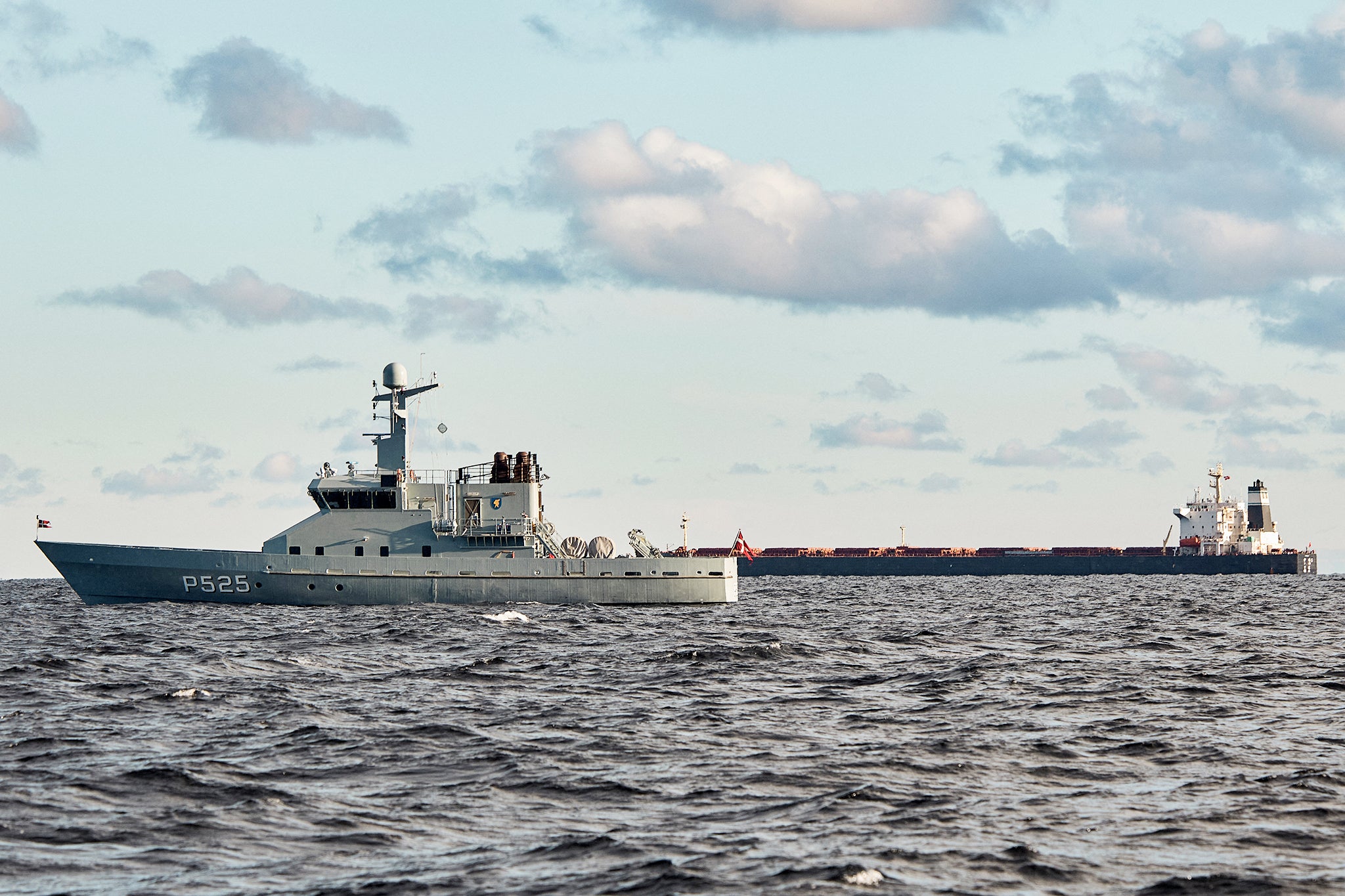 The Chinese ship Yi Peng 3 (right), being monitored by a Danish naval patrol vessel last November