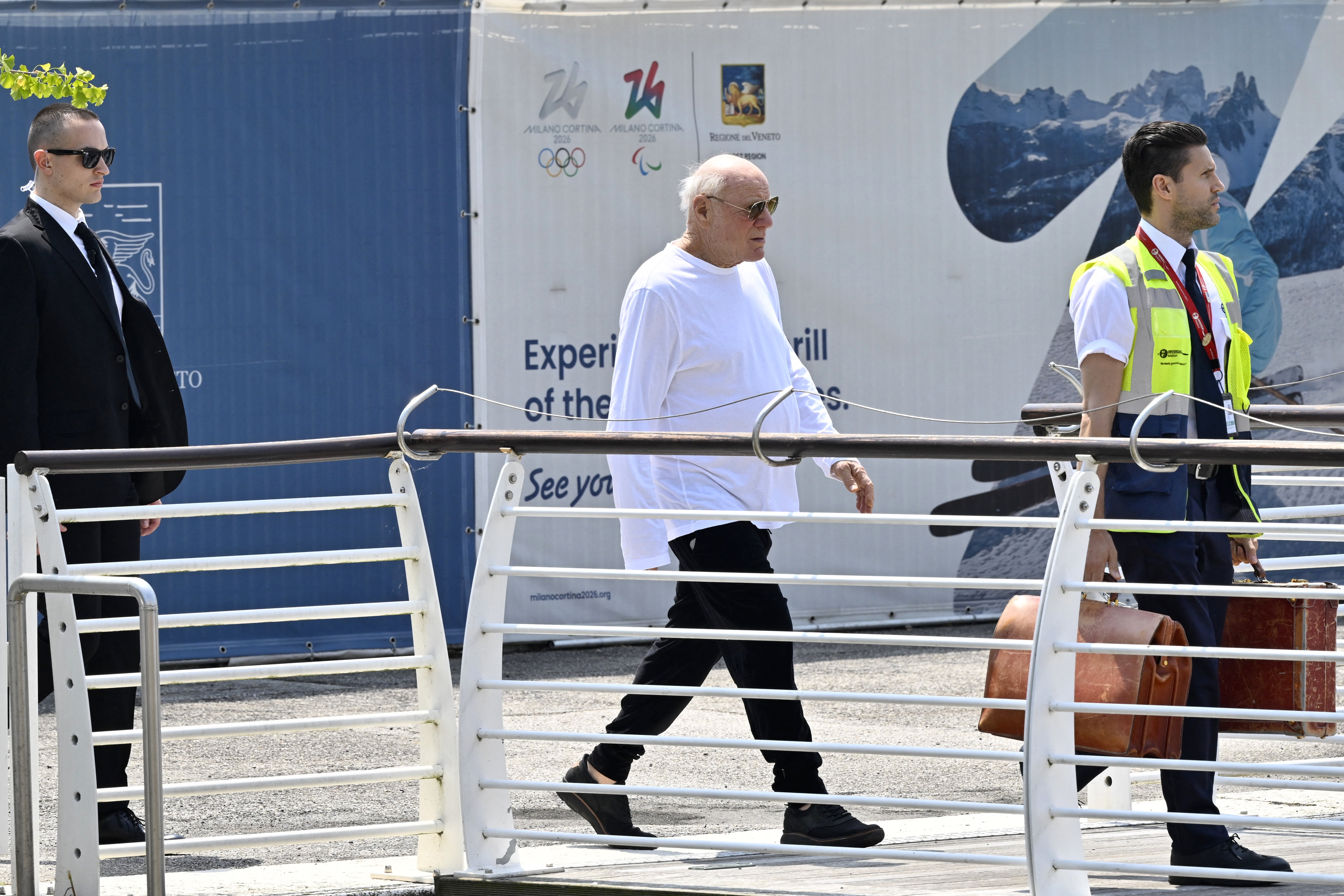 US businessman Barry Diller walks to board a taxi-boat after his arrival at Venice Marco Polo airport ahead of Jeff Bezos' wedding