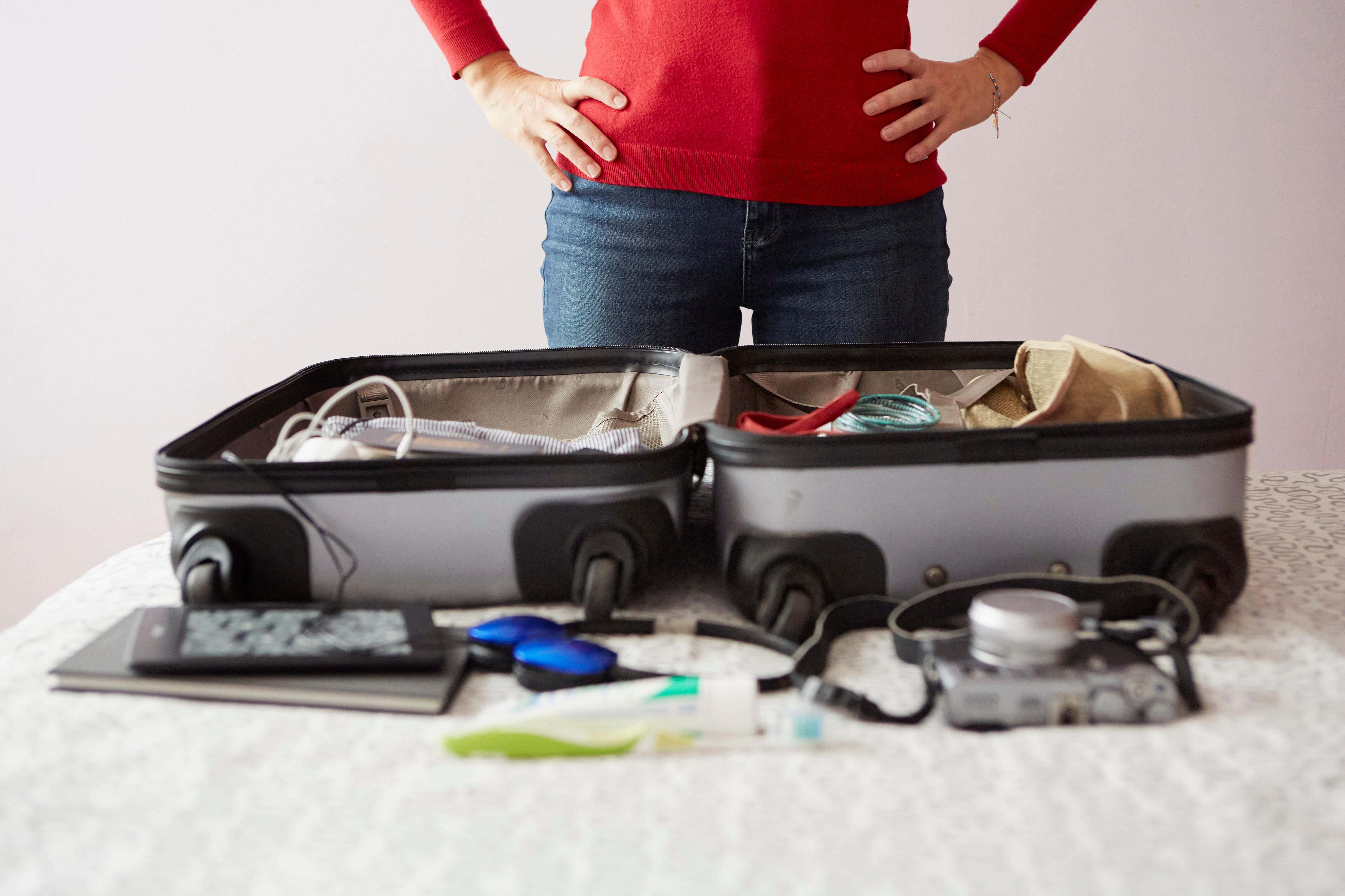 Try rolling clothes tightly, use packing cubes, and utilise every nook and cranny within your luggage