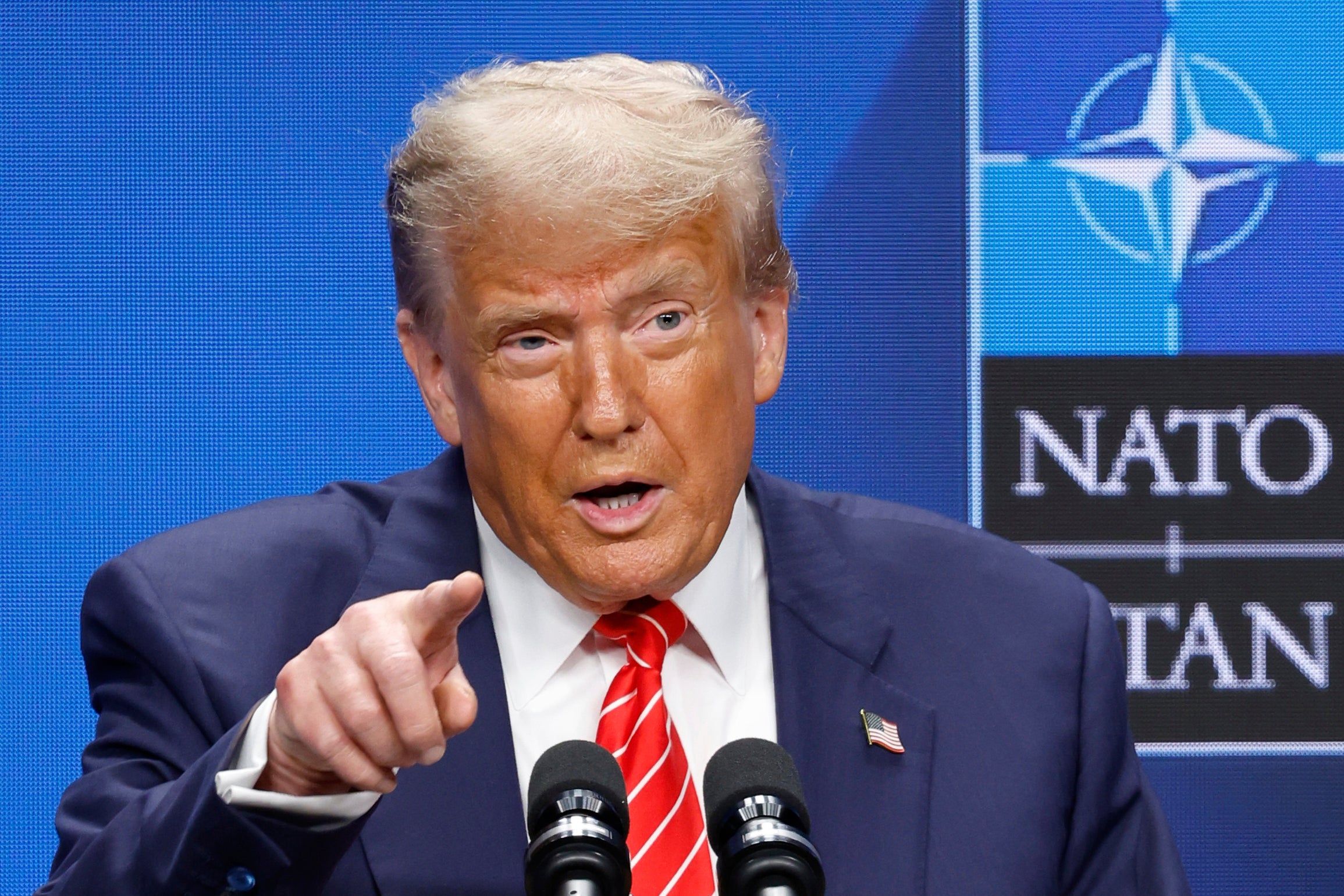 Donald Trump speaks at a press conference during the Nato summit in The Hague