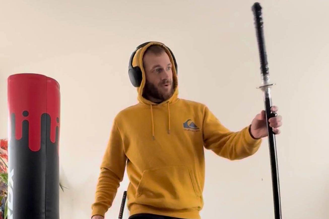 Marcus Arduini Monzo with a samurai sword that was shown to the jury in his trail at the Old Bailey (Metropolitan Police/PA)