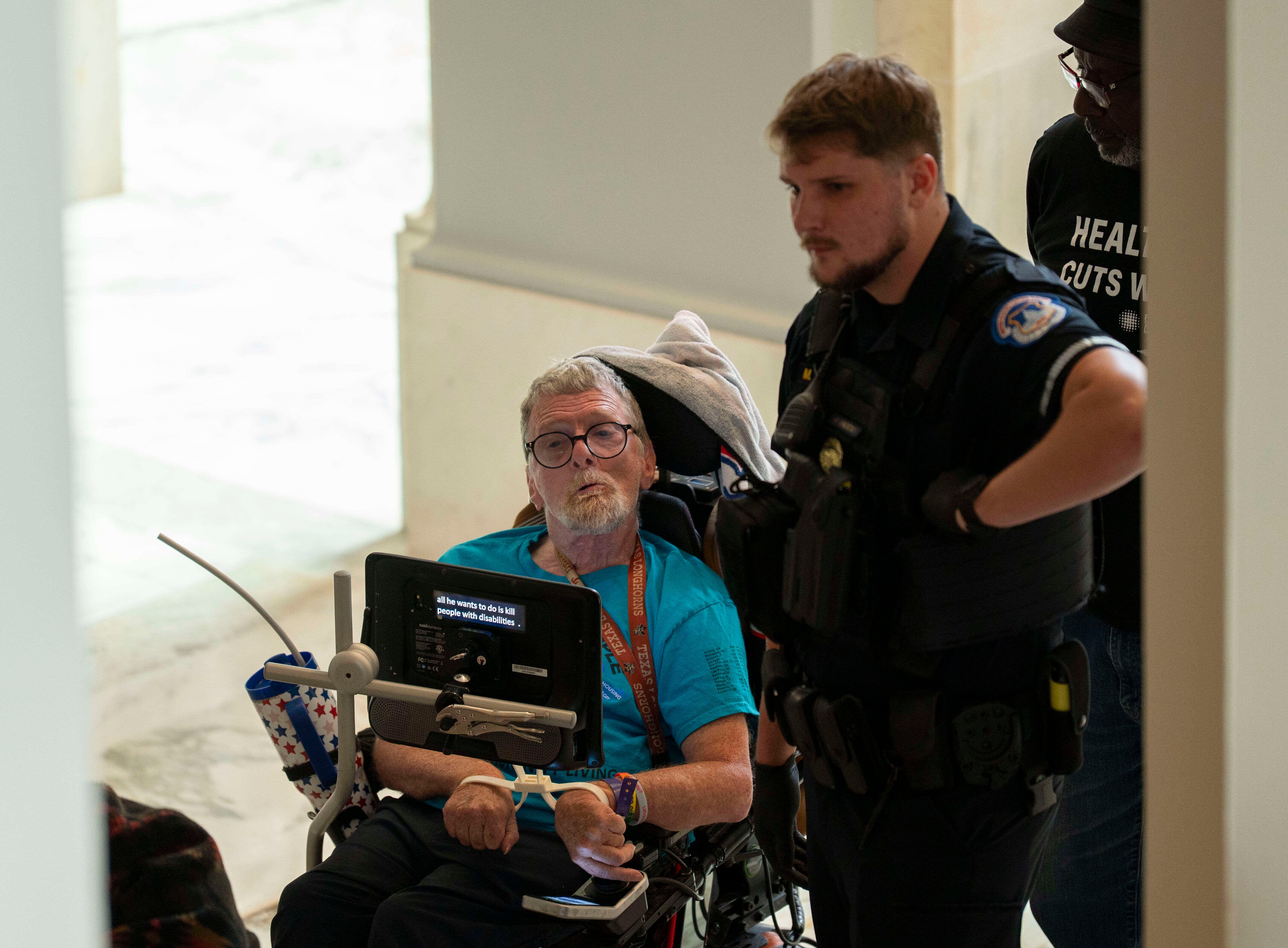 Protesters in wheelchairs were cuffed with zip-ties as they protested proposed cuts to Medicaid on June 25