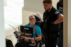 Protesters in wheelchairs cuffed with zip-ties during Capitol demonstrations against Medicaid cuts