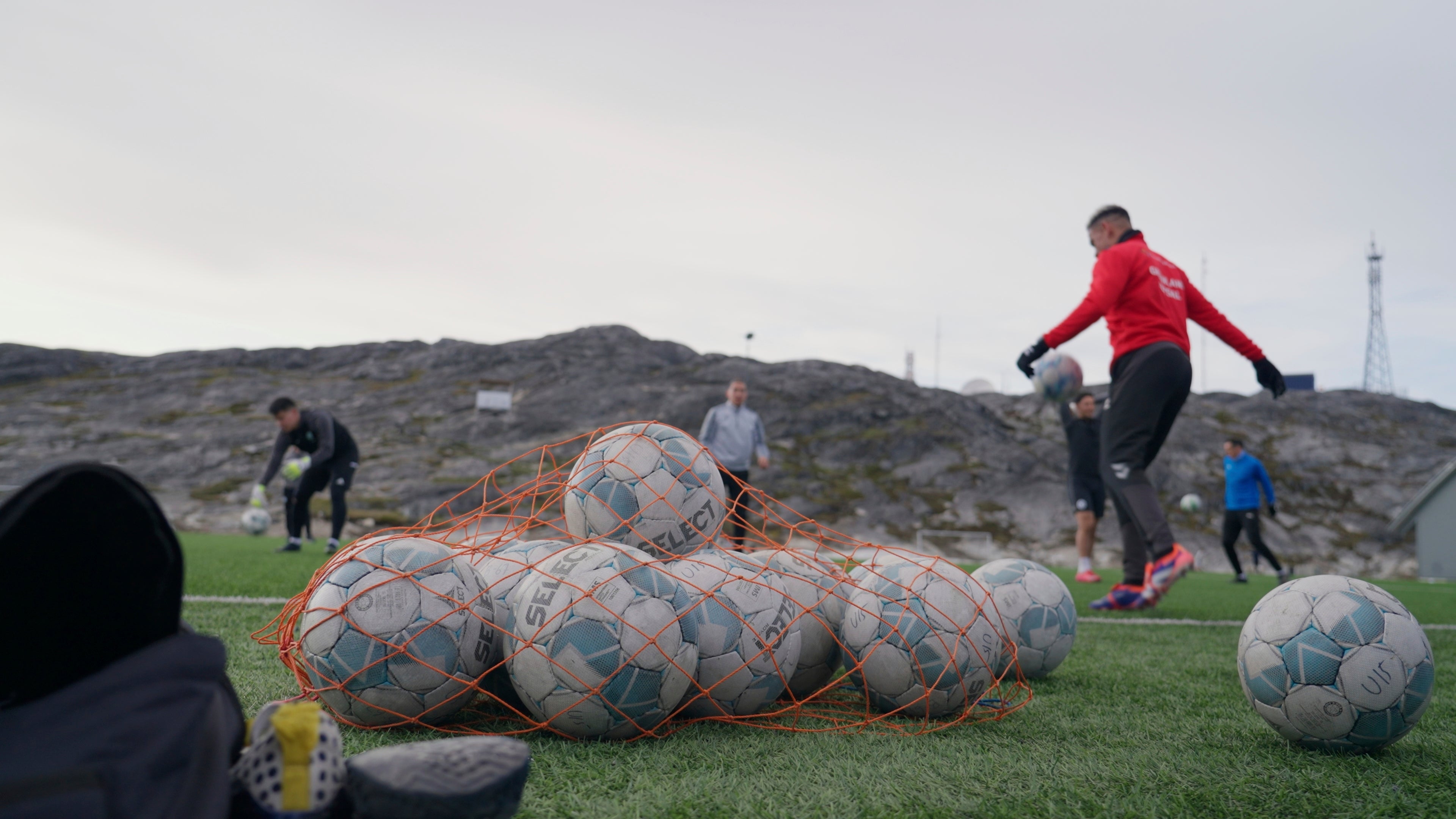 Players take part in a training session at Nuuk stadium in Nuuk, Greenland, on 17 June 2025
