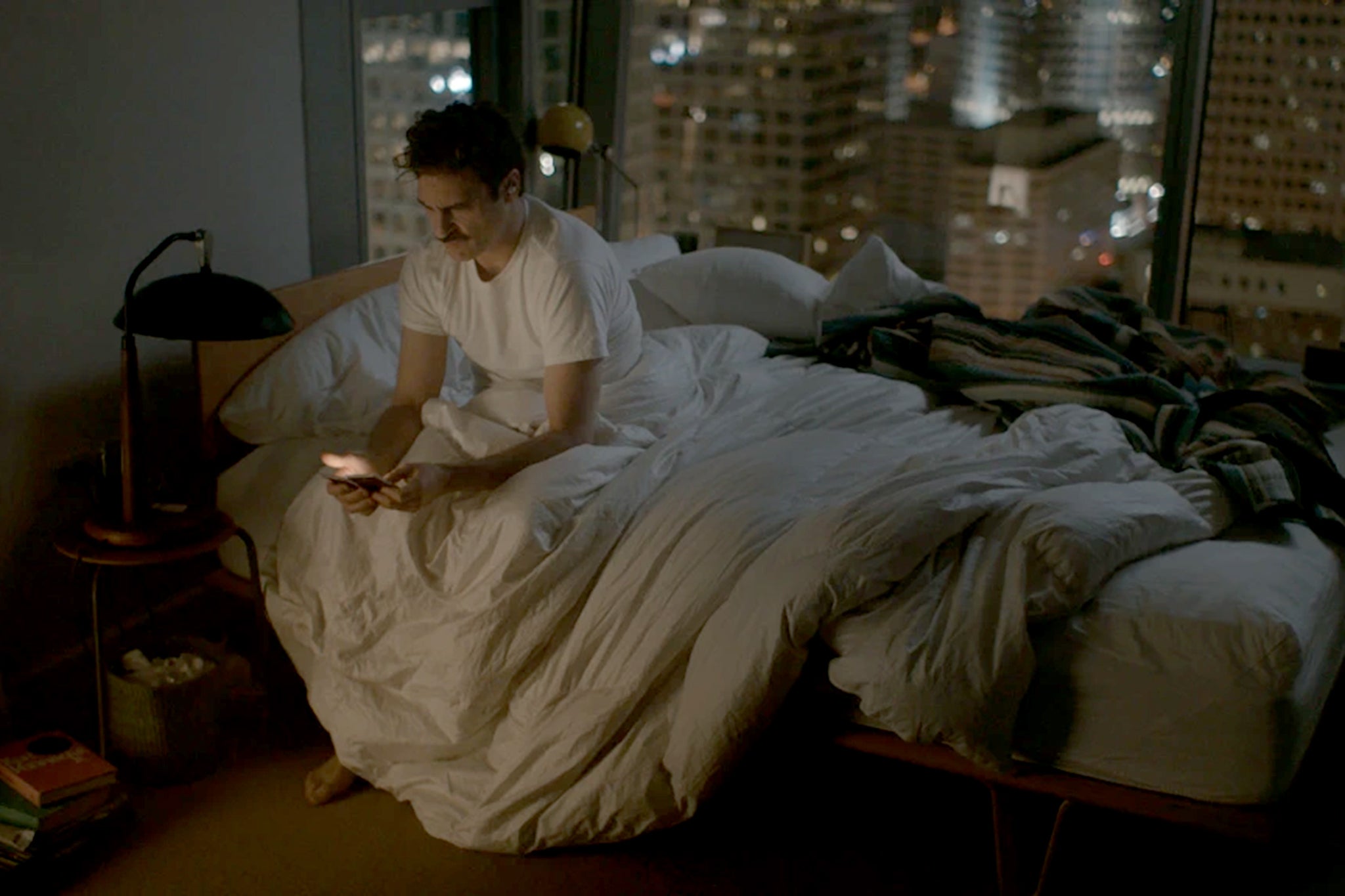 Joaquin Phoenix in the film Her which imagined a man falling in with an AI bot