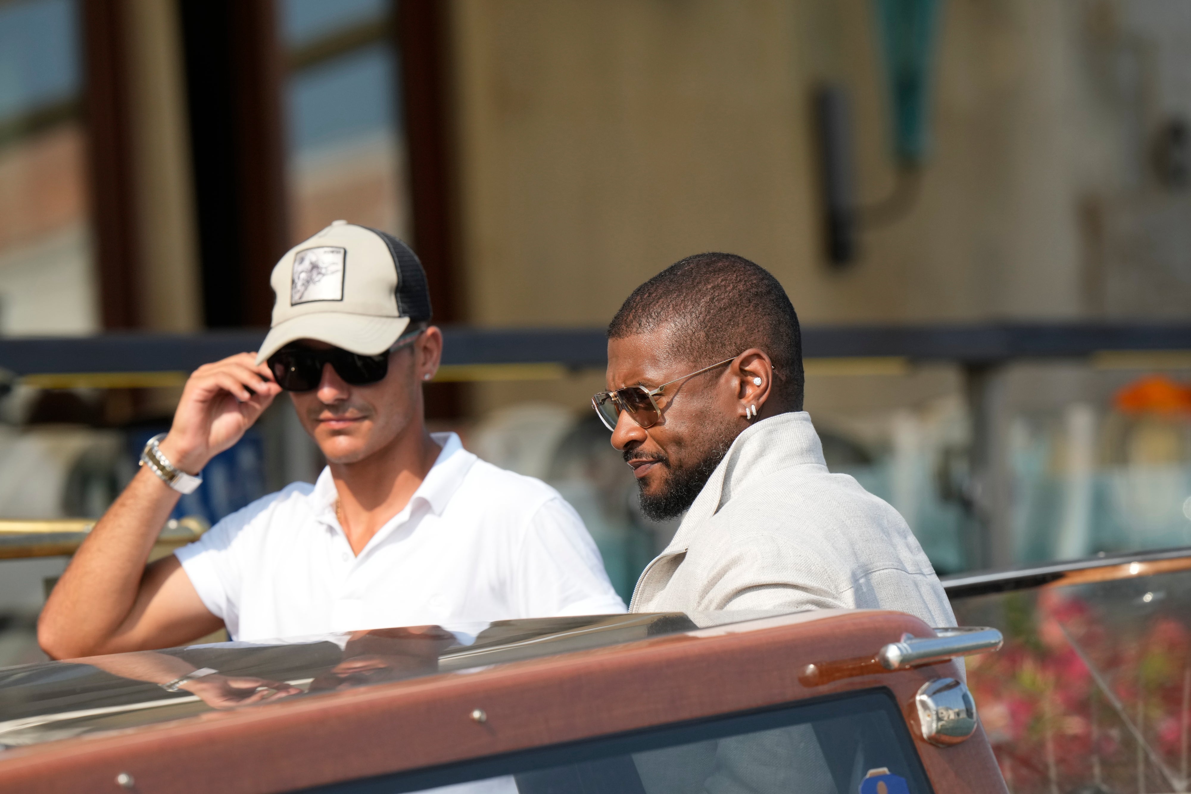 Usher arrives at the Gritti hotel in Venice