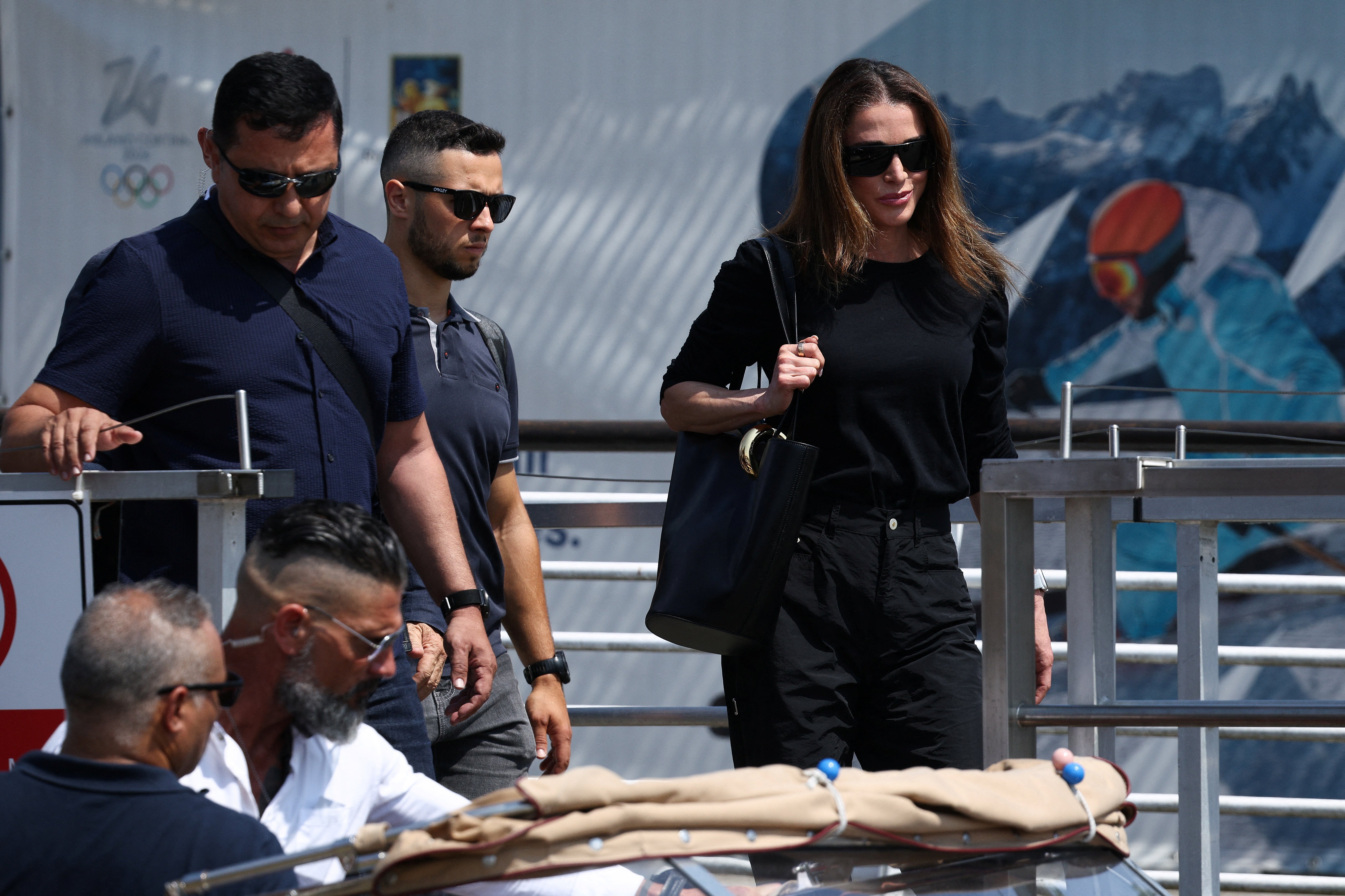 Queen Rania of Jordan arrived at the Venice Marco Polo airport flanked by security