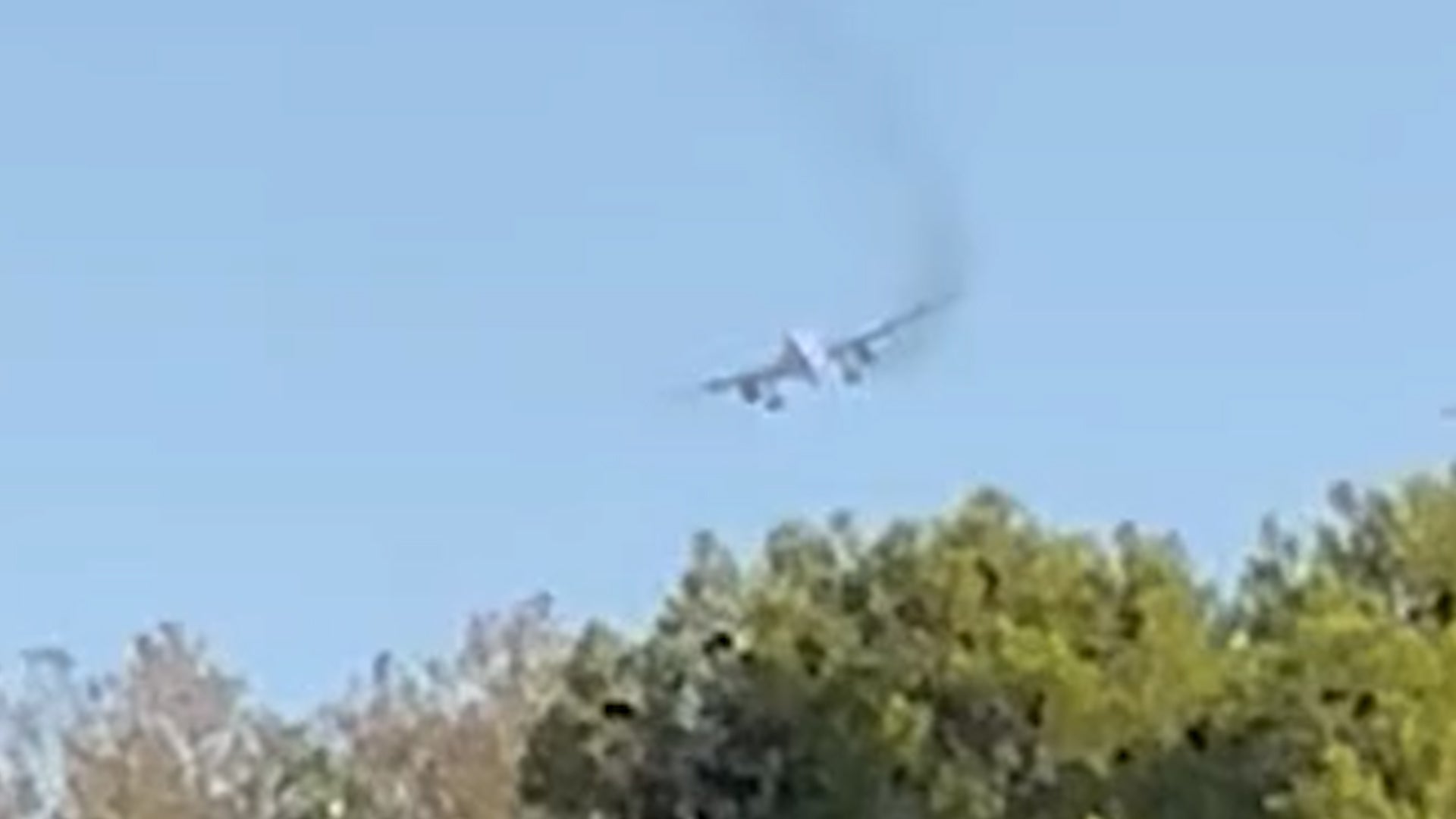 <p>An American Airlines flight was forced to turn around as witnesses see ‘flames and smoke’ coming from the plane</p>