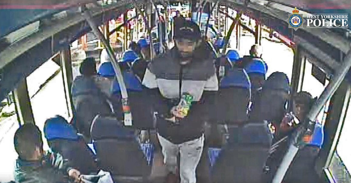 Habibur Masum, 26, (centre) on a bus prior to him attacking his wife