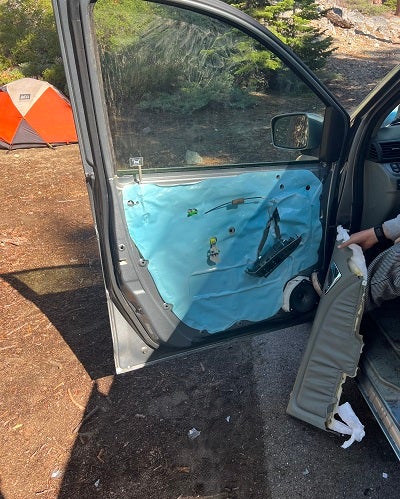 Another photograph shared by the CDFW showed a damaged vehicle door, caused by the mother bear