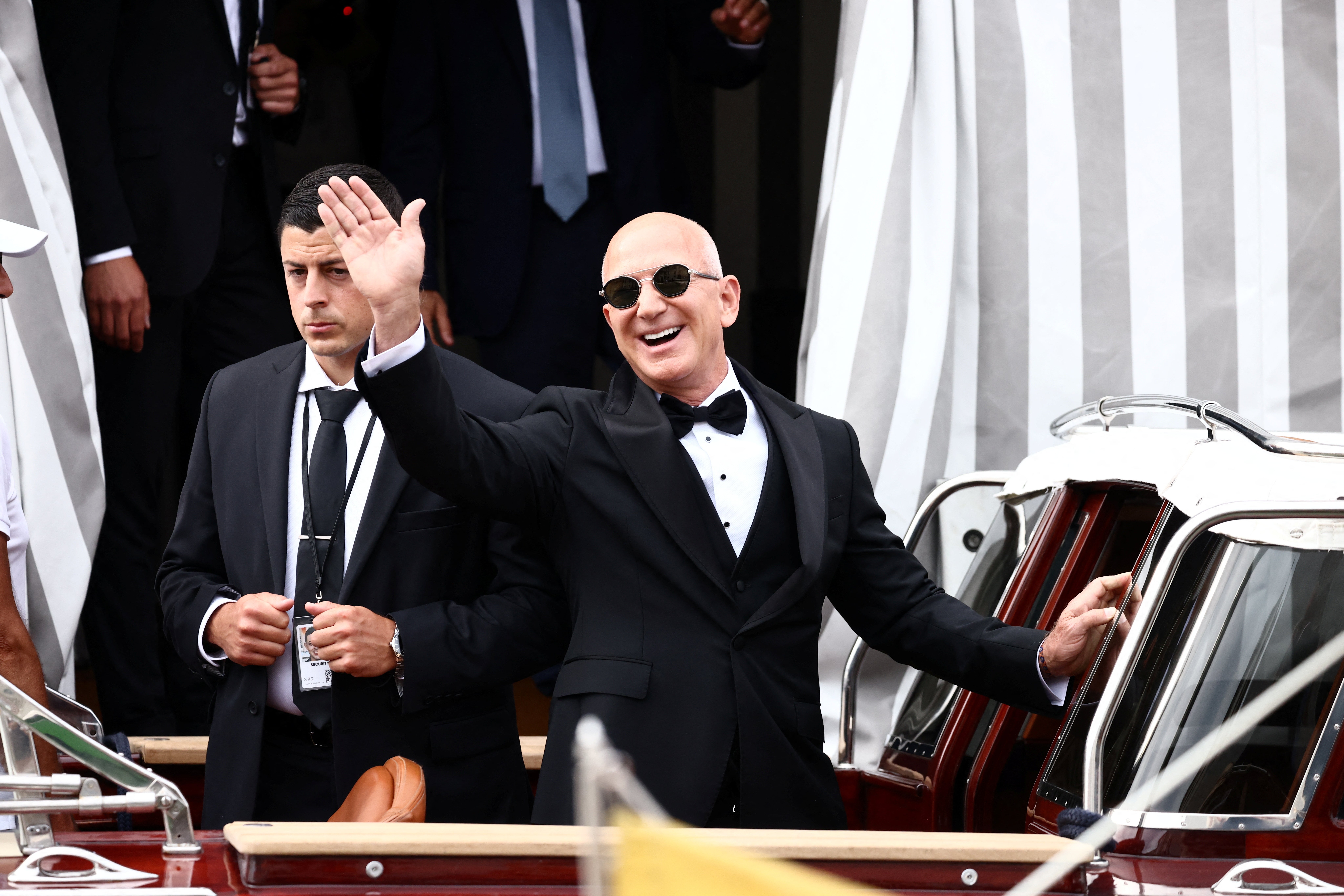 Bezos cut a suave figure in a classic black tuxedo for his wedding day