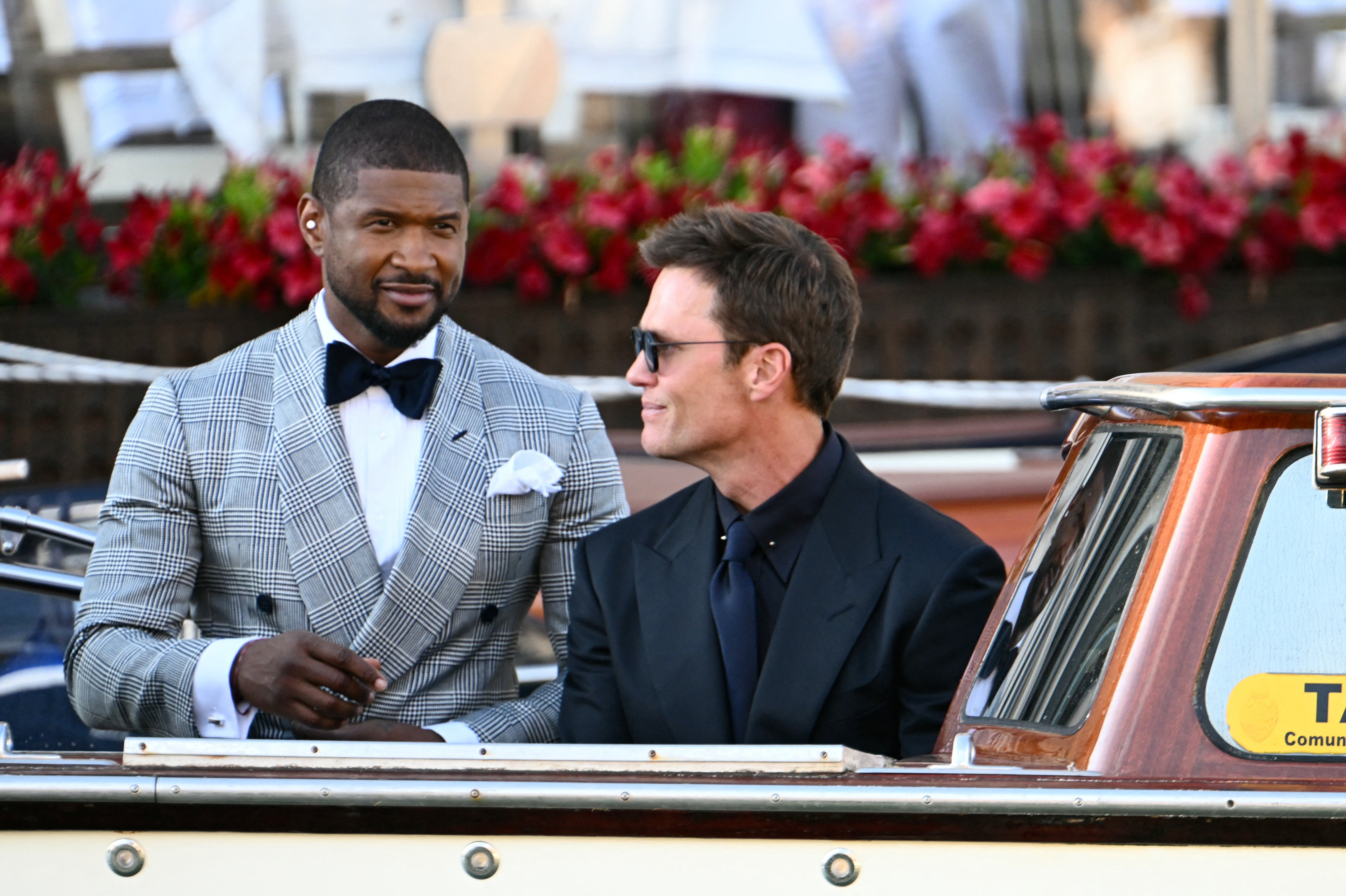 The ‘Yeah!’ singer amazed in neutrals complete with a black and white patterned suit jacket, bow tie, and a white pocket square to tie the look together
