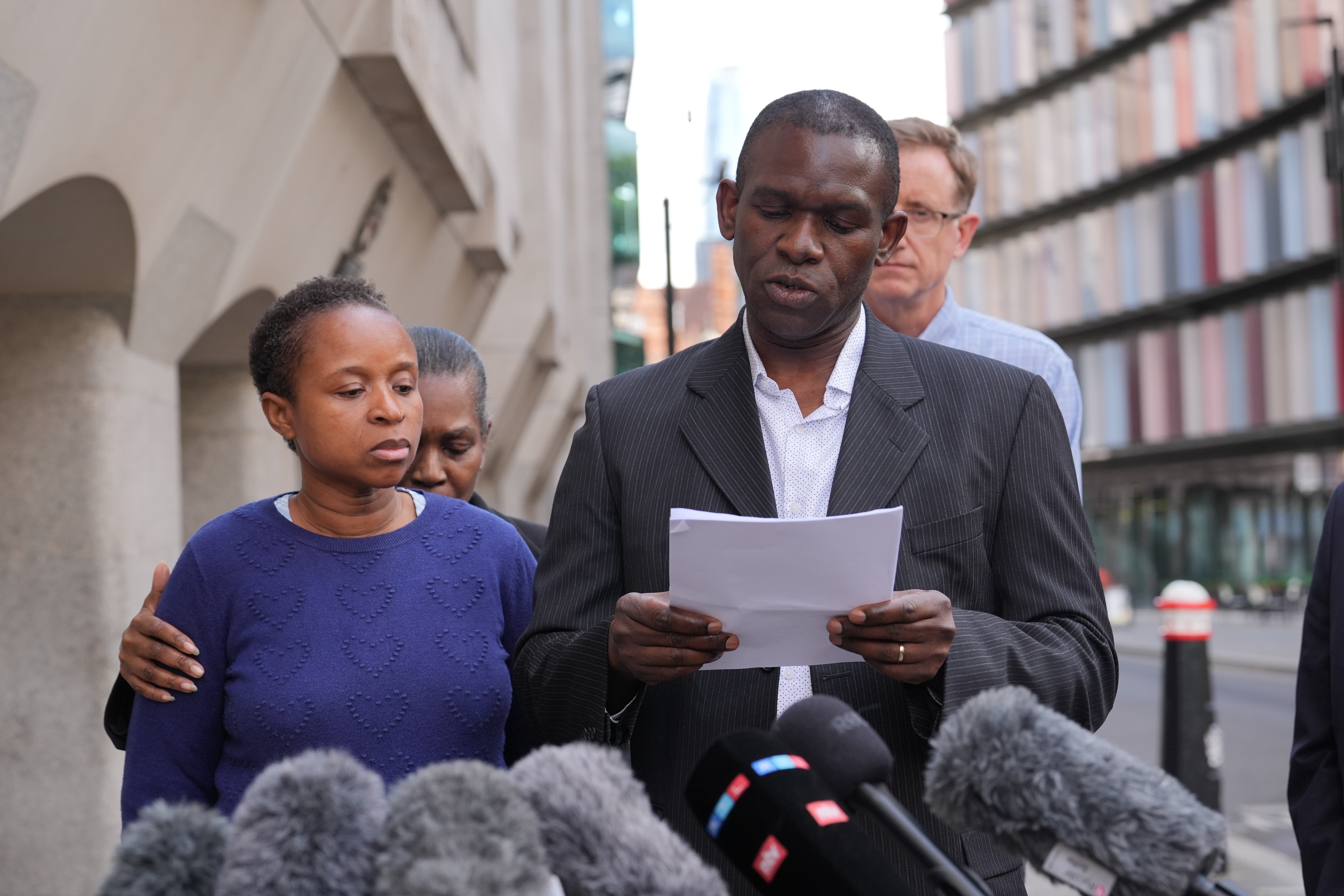 Dr Ebenezer Anjorin and his wife Grace speaking outside the Old Bailey (Lucy North/PA)