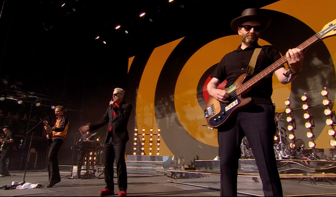 Peter Capaldi appears live on stage with Franz Ferdinand at Glastonbury