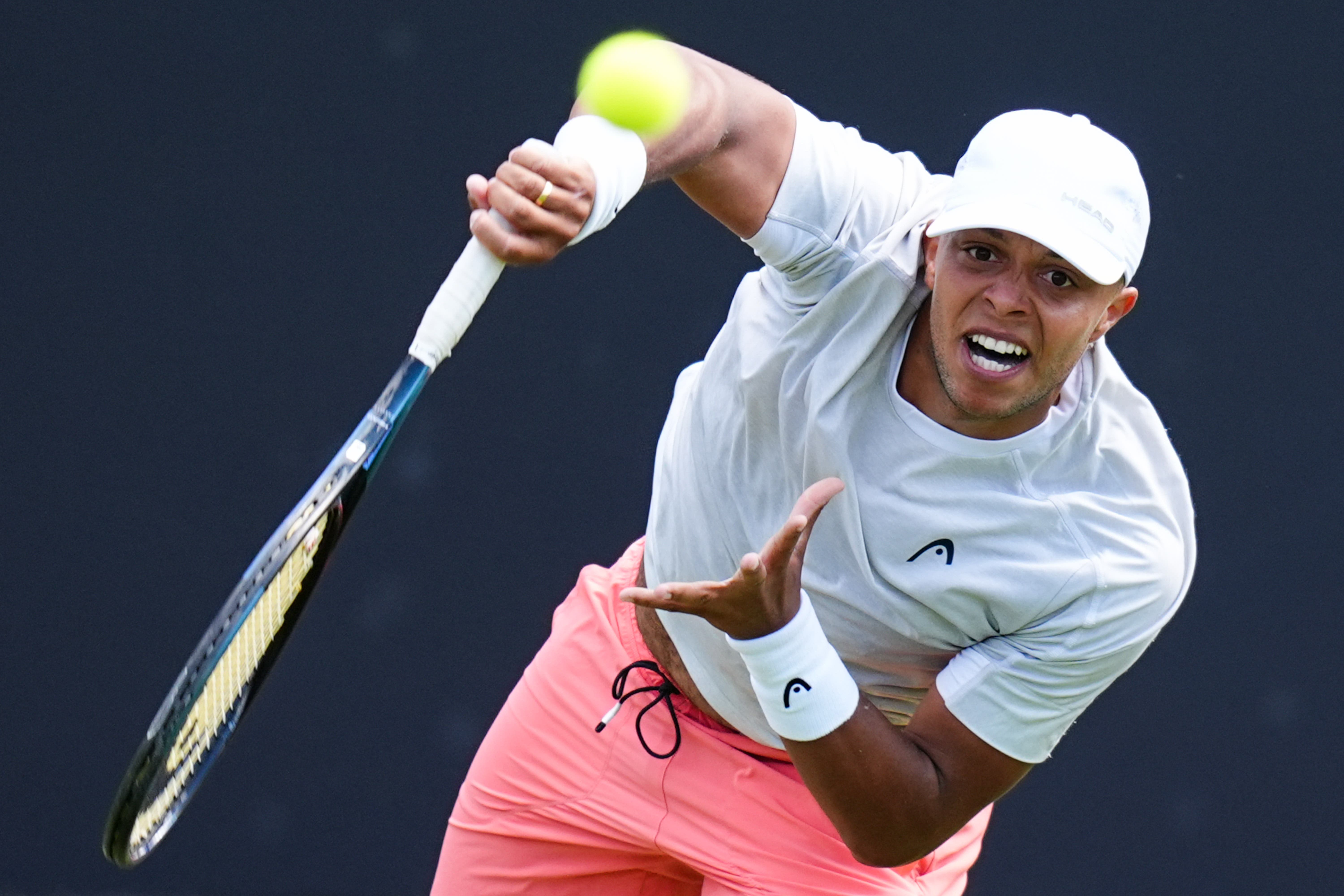 Jay Clarke hits a serve (Jacob King/PA)