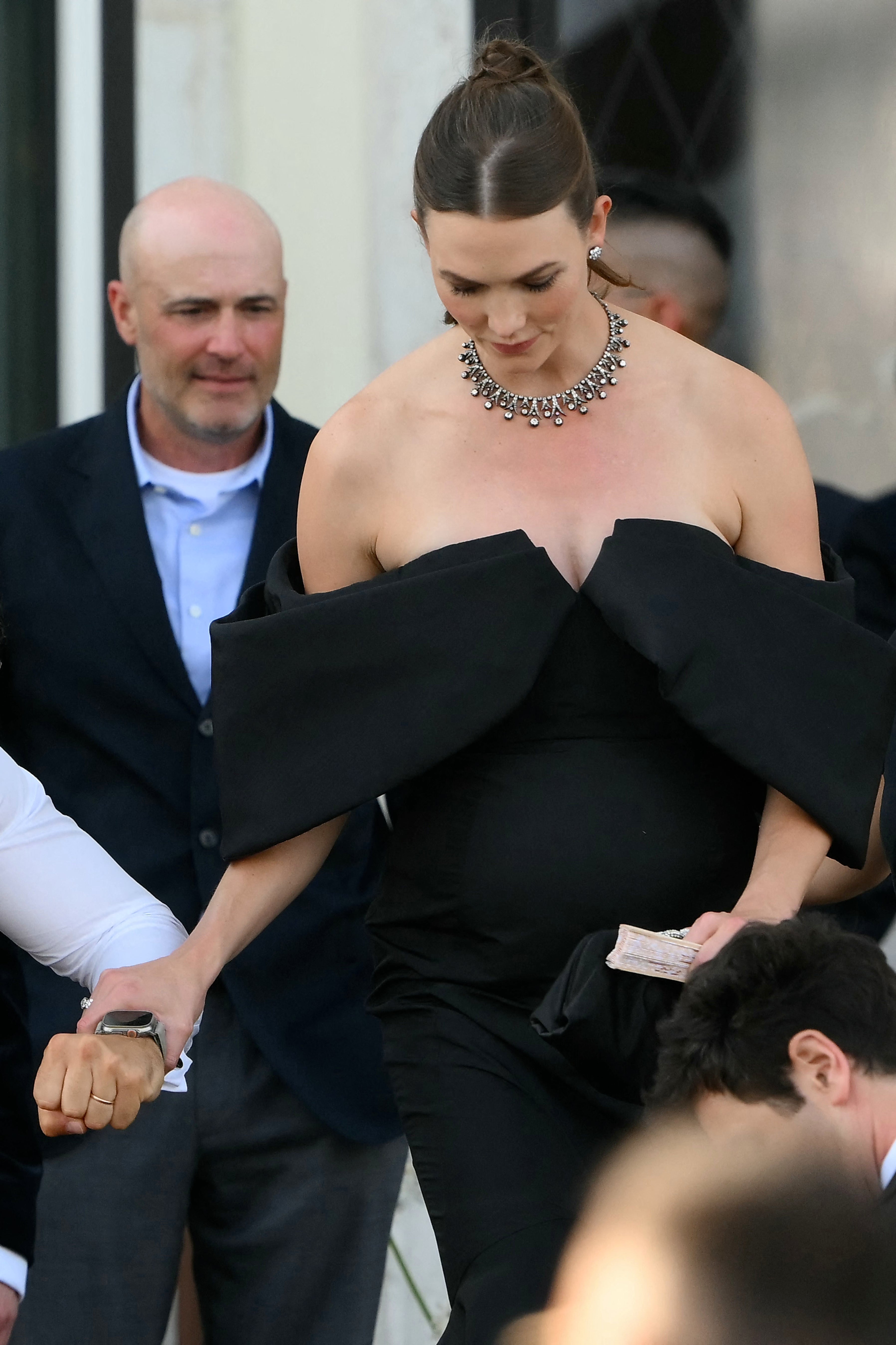 The model wore a strapless black gown with oversized sleeves that came across as baggy rather than intentional