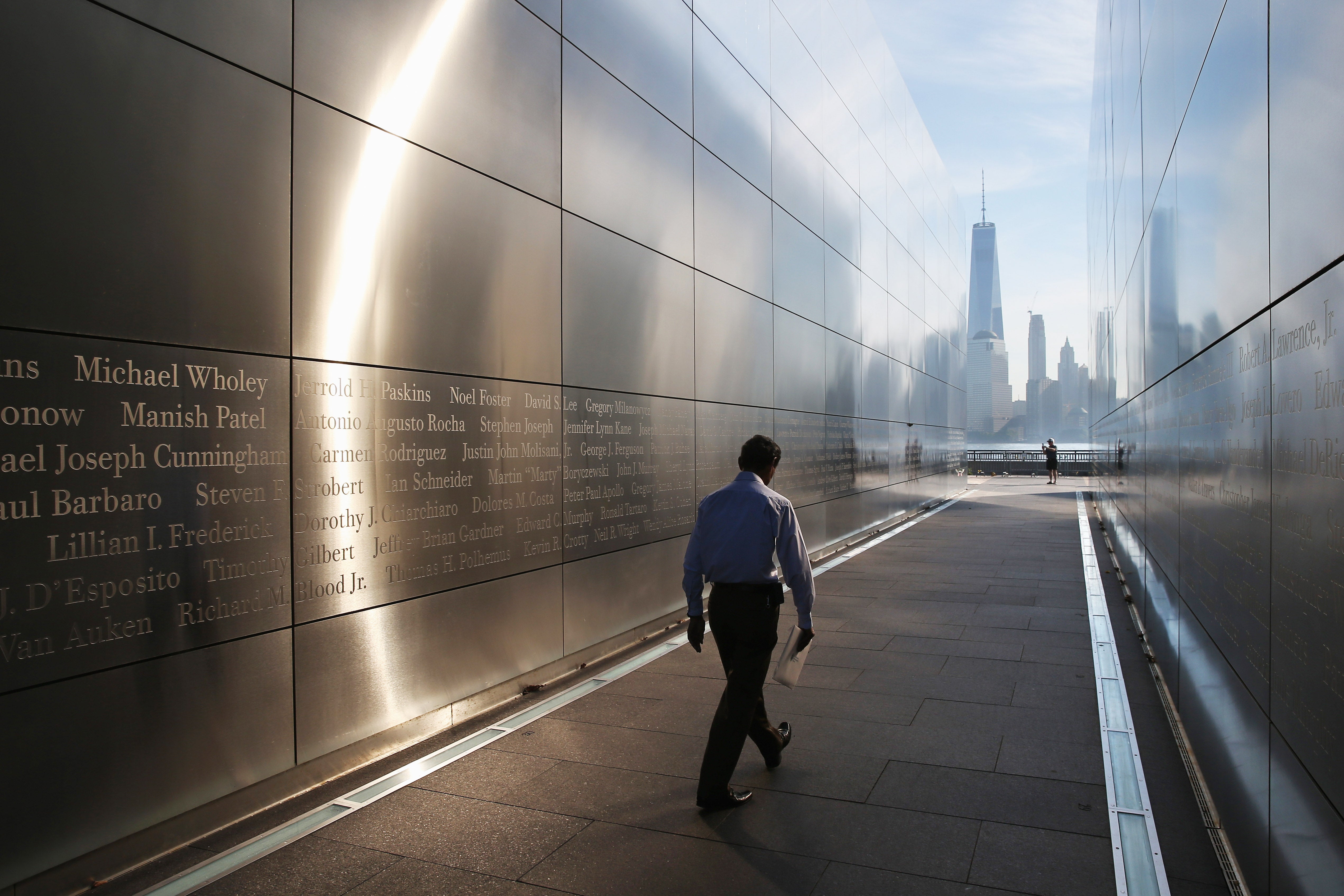 Locals are not only upset because of the aesthetics of the concrete walls, but the names of 18 New Jerseyans are still reportedly missing from the memorial, their families said.