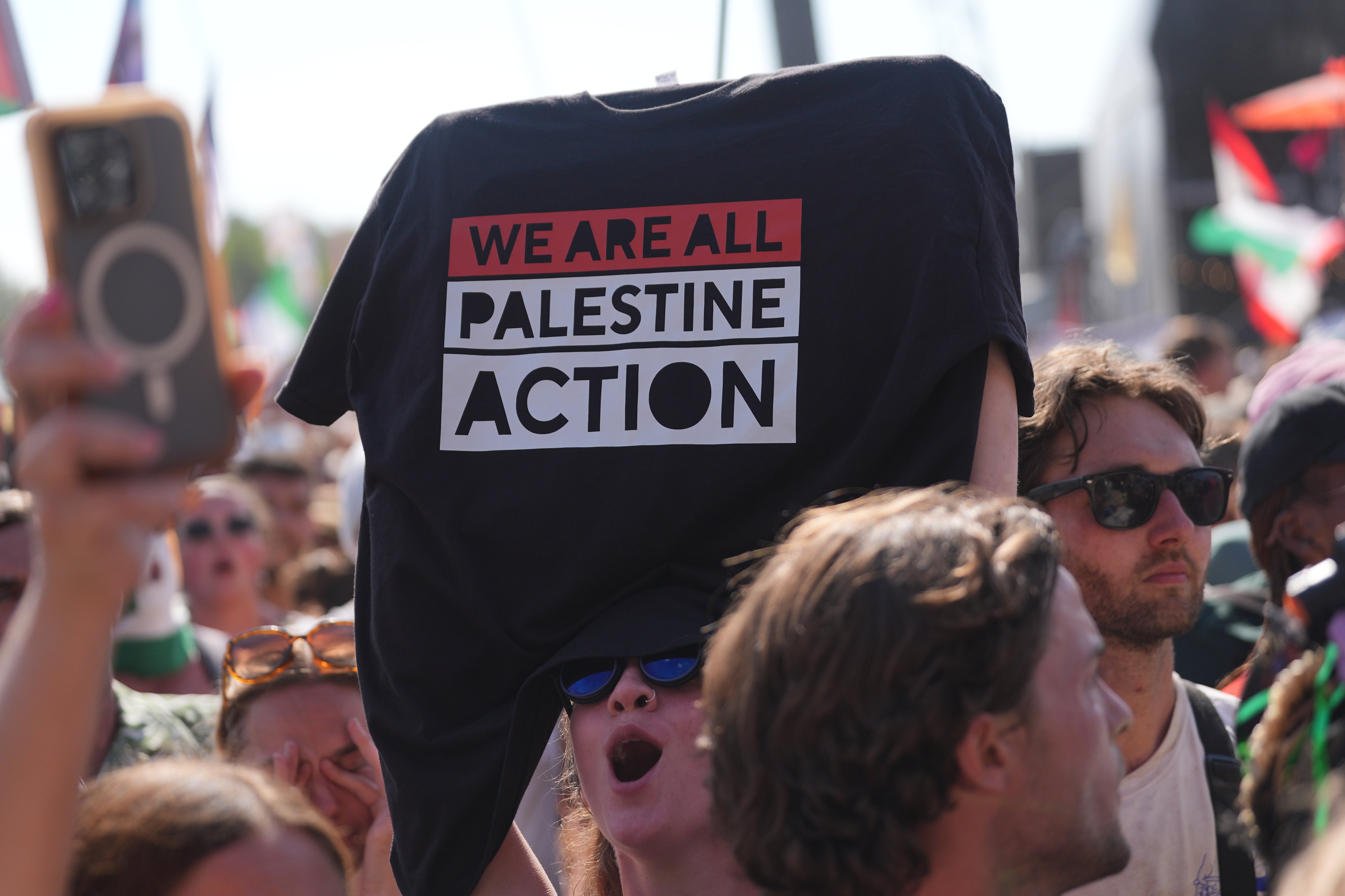 There was a display of pro-Palestinian flags and t-shirts during Kneecap’s set