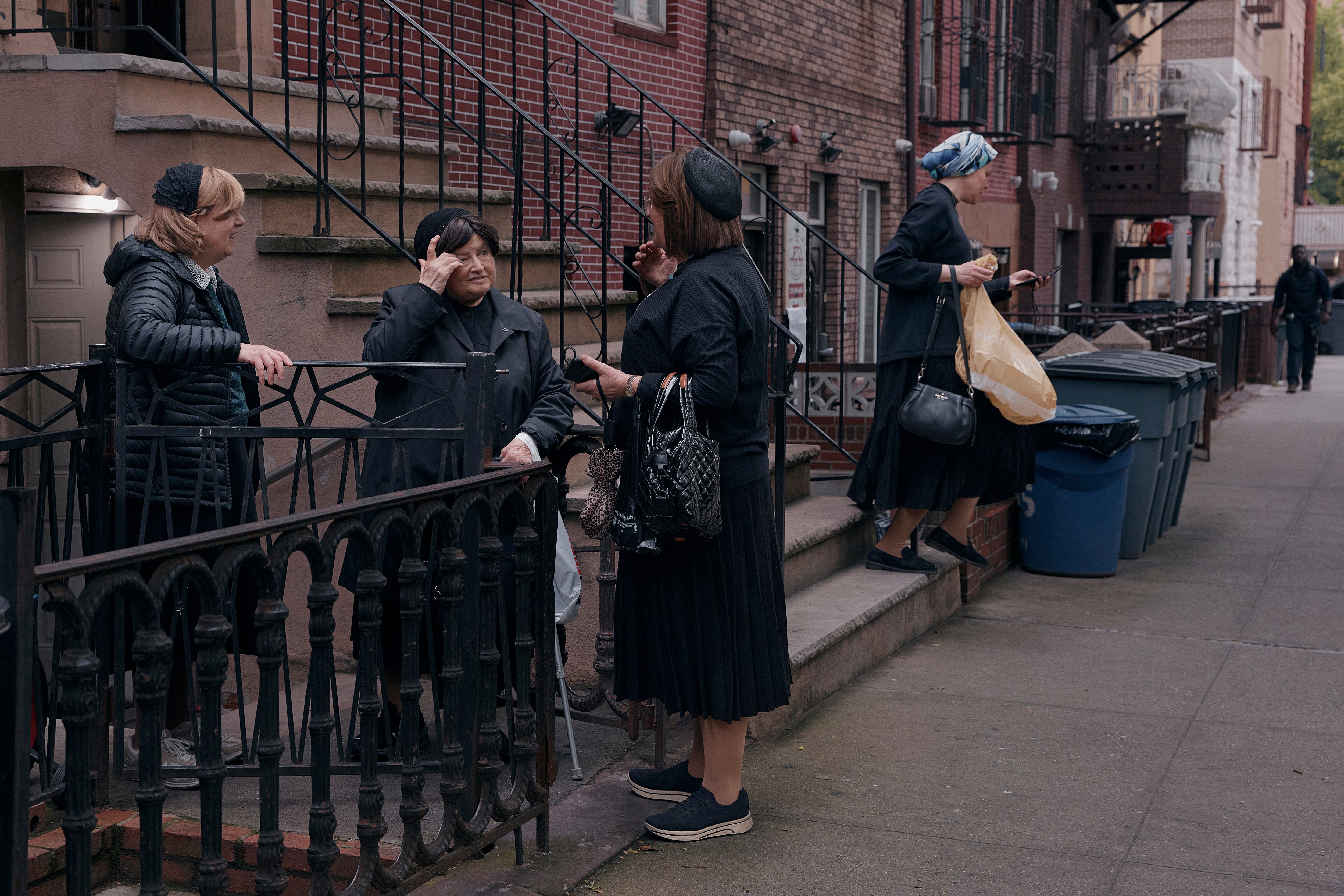 Hasidic Jewish women chat on Monday, June 16, 2025, in the Brooklyn borough of New York
