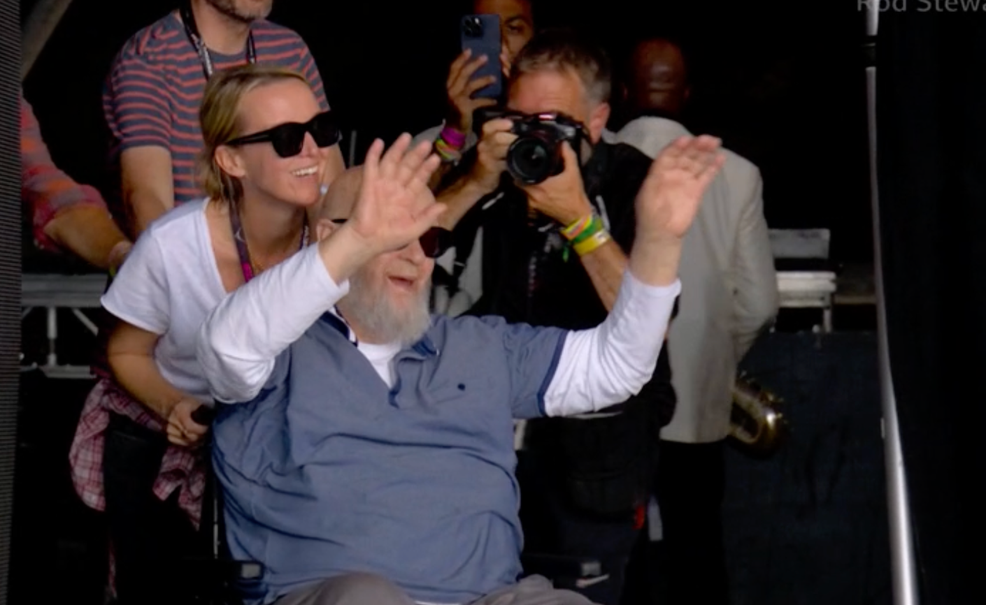 Emily Eavis brings her father Michael on stage for a set of Rod Stewart