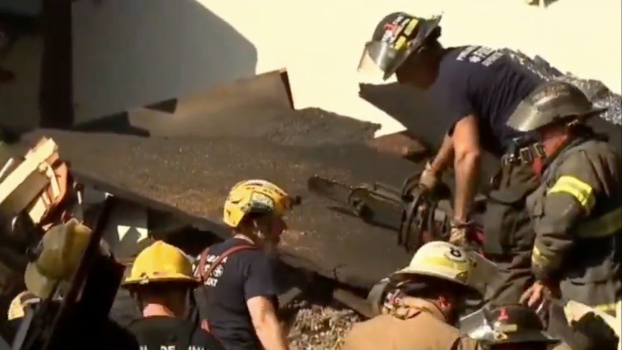 At least one person was killed and two others were injured when several rowhomes collapsed in Philadelphia overnight Saturday