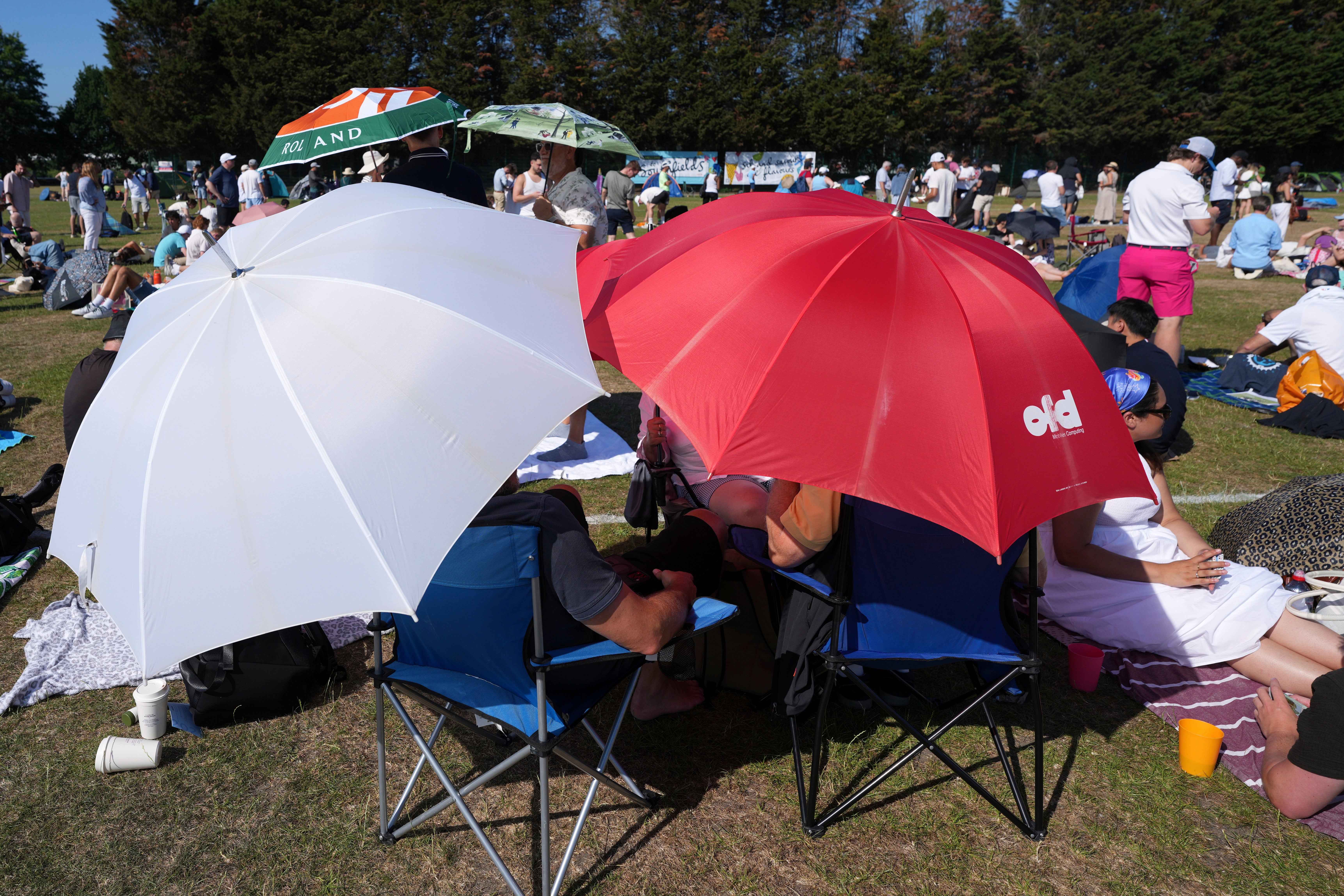 Fans in the queue outside the Wimbledon grounds