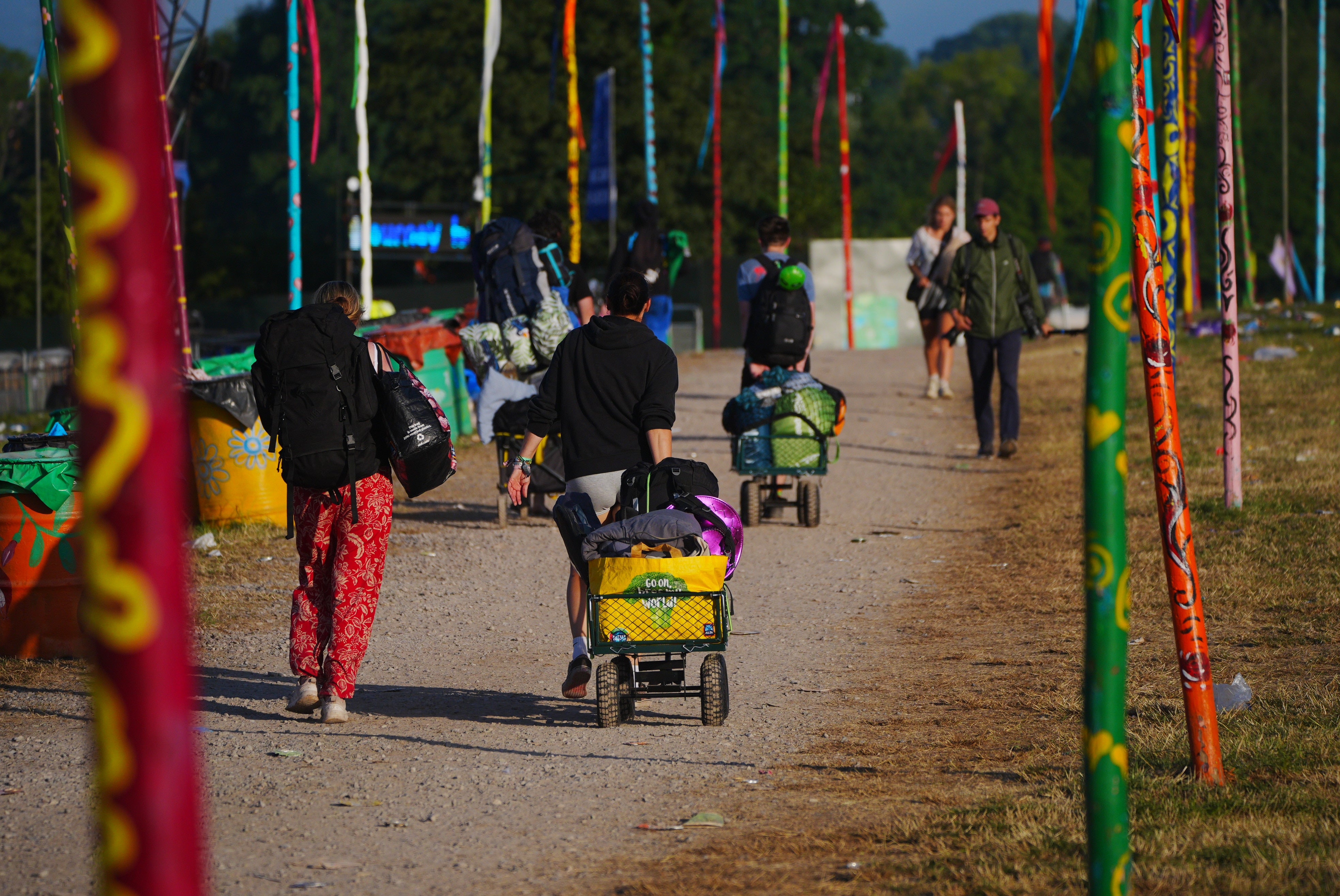 Festivalgoers begin their journeys home at the end of the Glastonbury Festival
