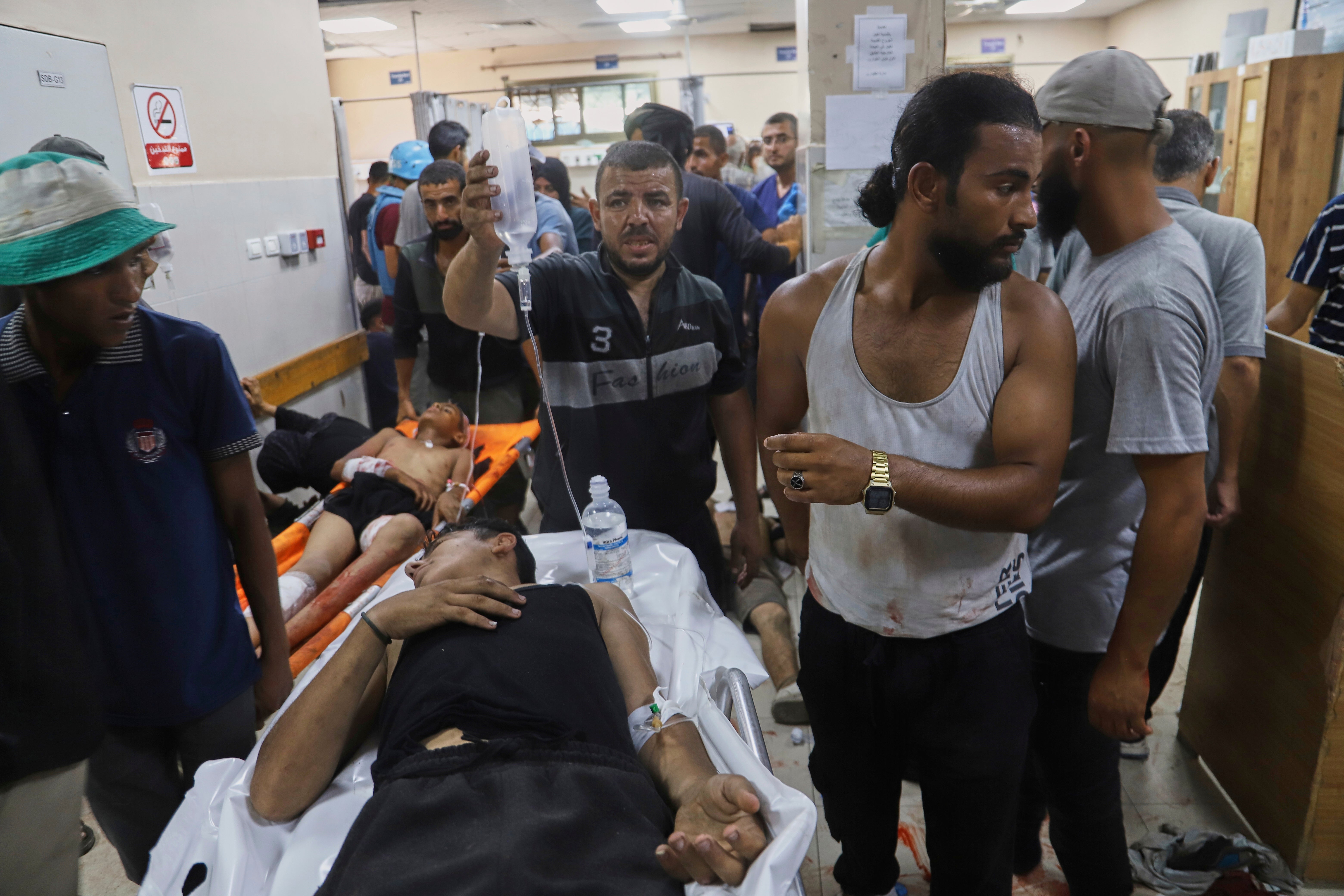 Palestinians wounded after visiting a Gaza Humanitarian Foundation aid site