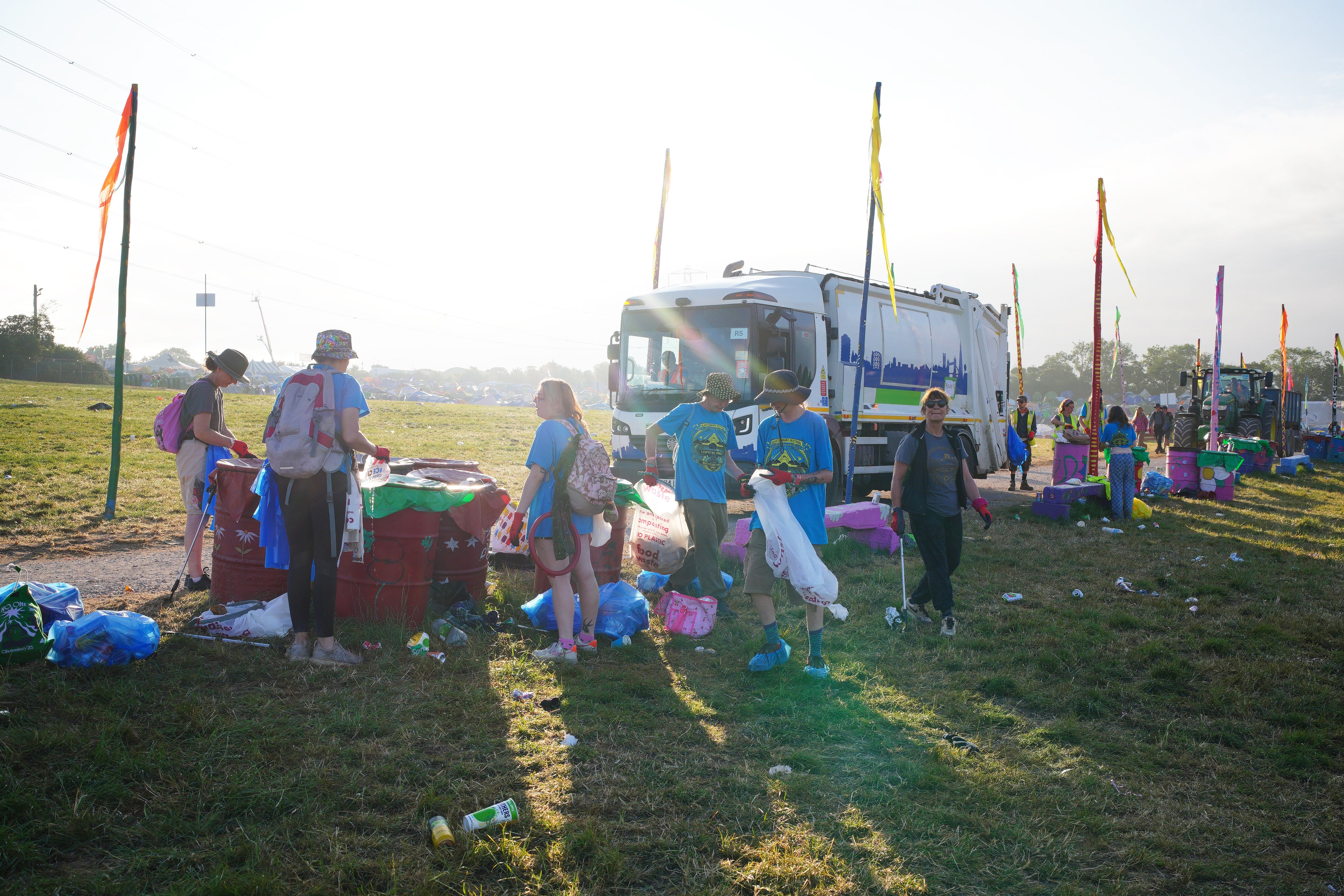 The clean-up operation begins at the end of the Glastonbury Festival at Worthy Farm in Somerset (Ben Birchall/PA)