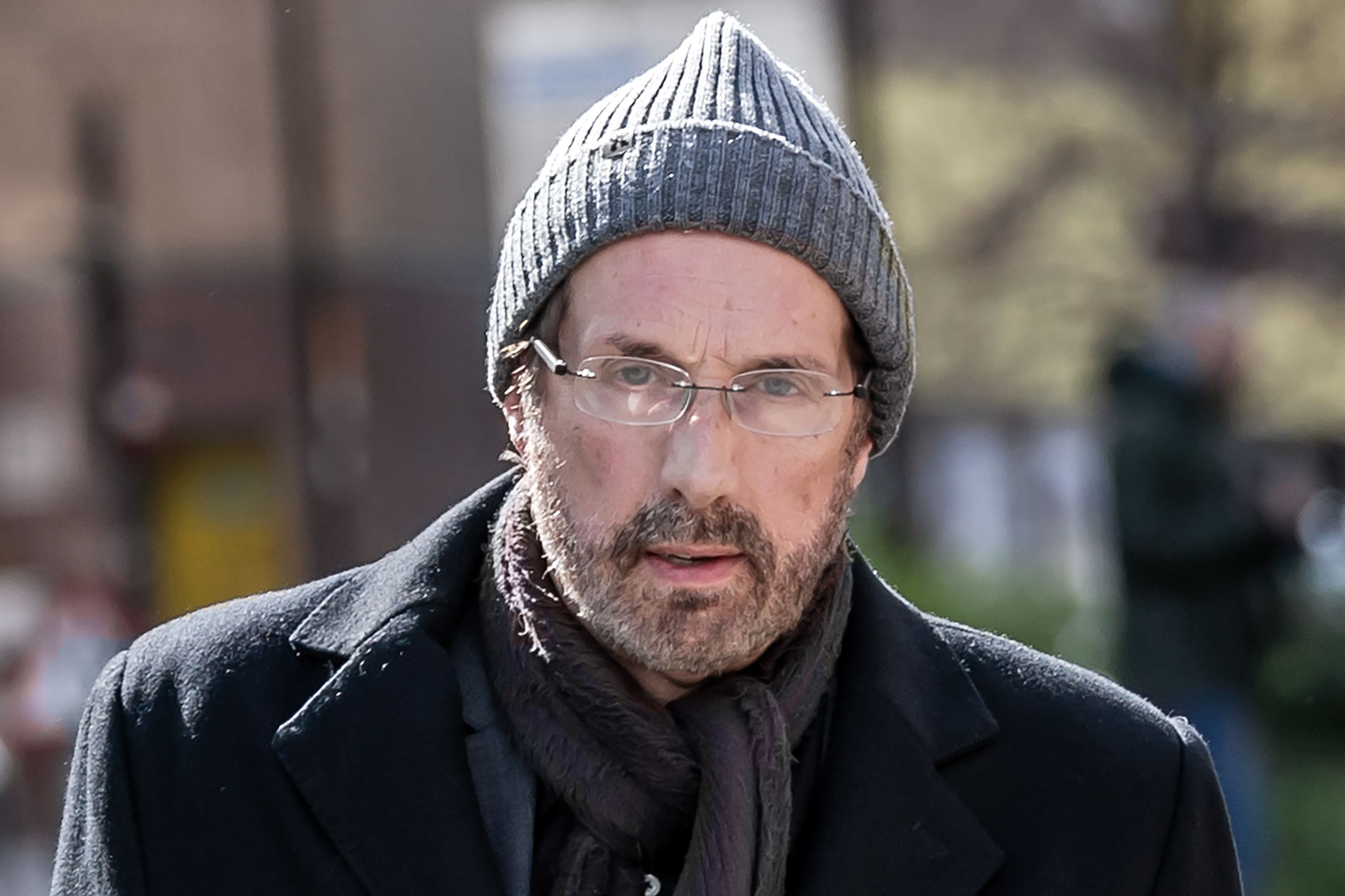 Christopher Brain denies one count of rape and 36 counts of indecent assault relating to 13 women