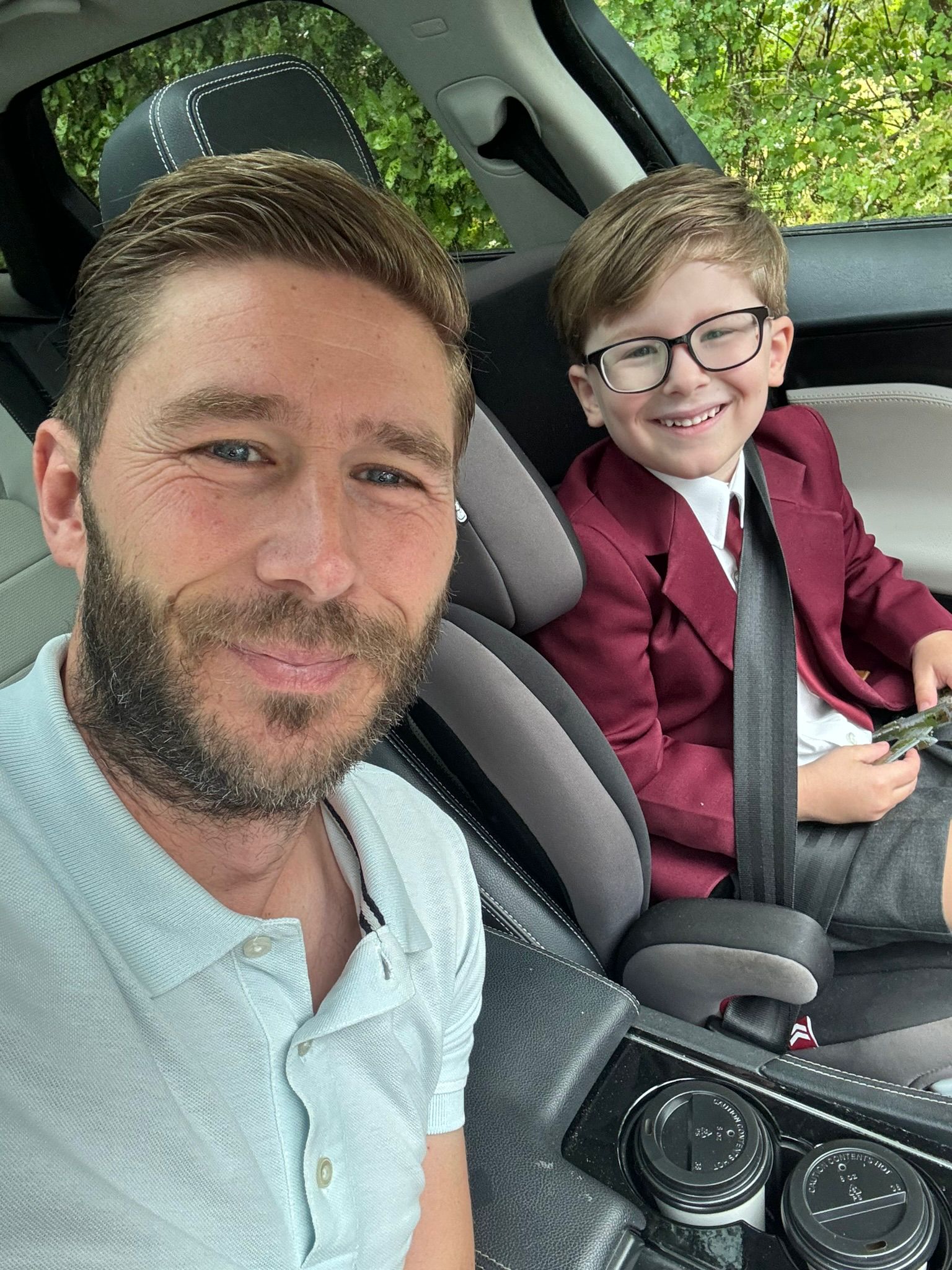 <p>Stacy Long, 40, on the school run with his son Paddy Dowling Long</p>