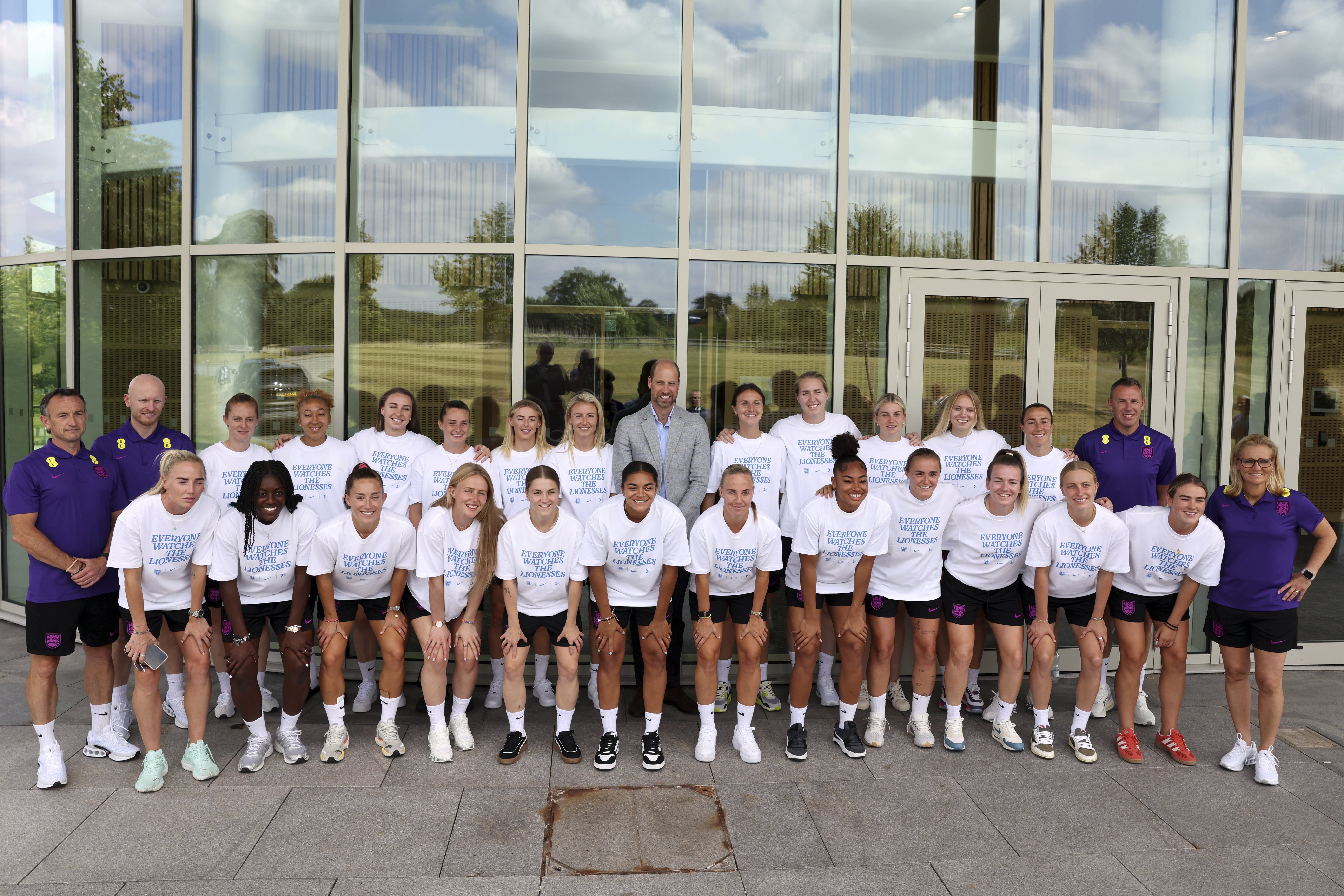 The Prince of Wales poses with squad members at St George’s Park