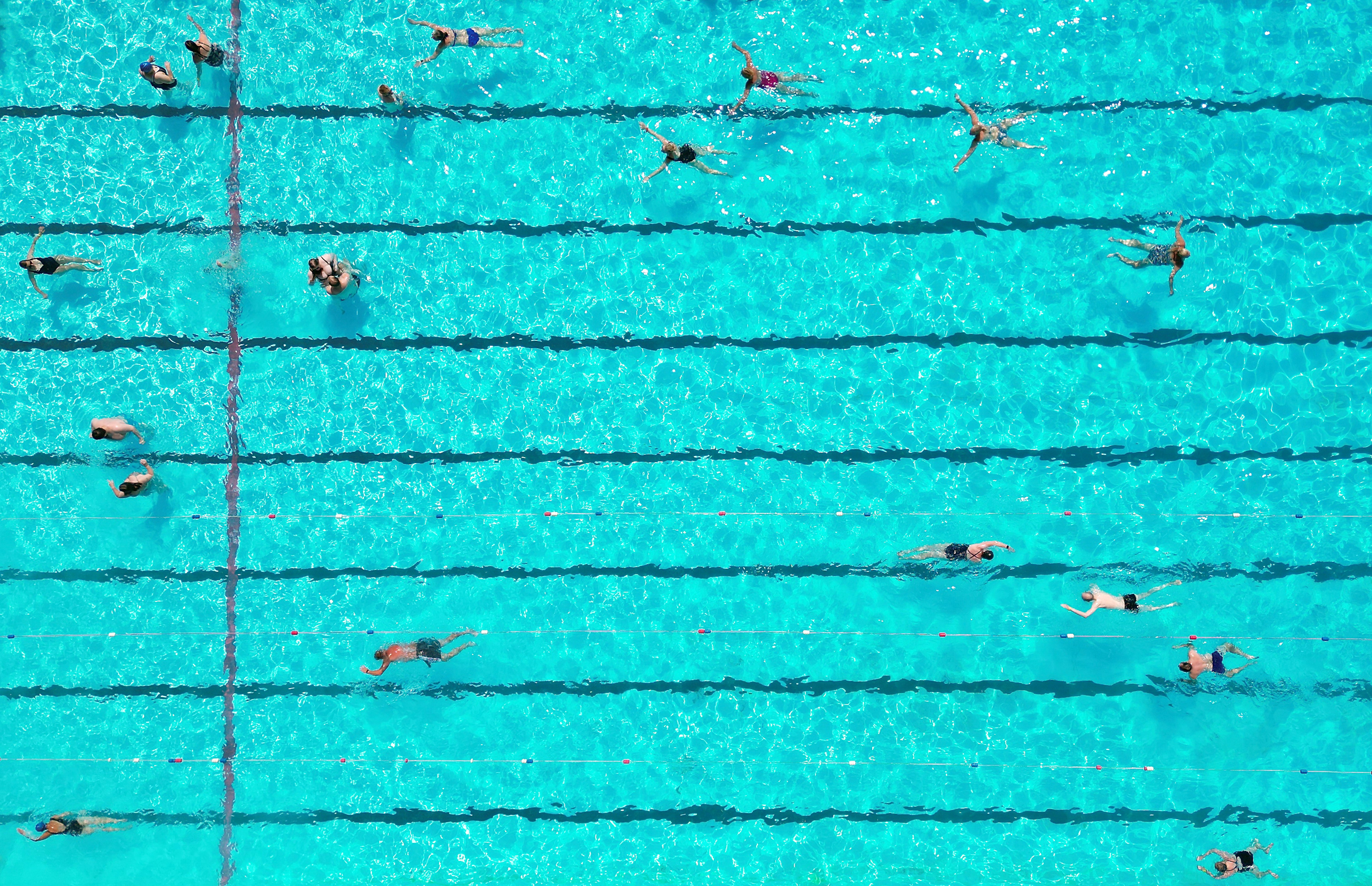 Swimmers cool off at Peterborough Lido in Cambridgeshire on Monday