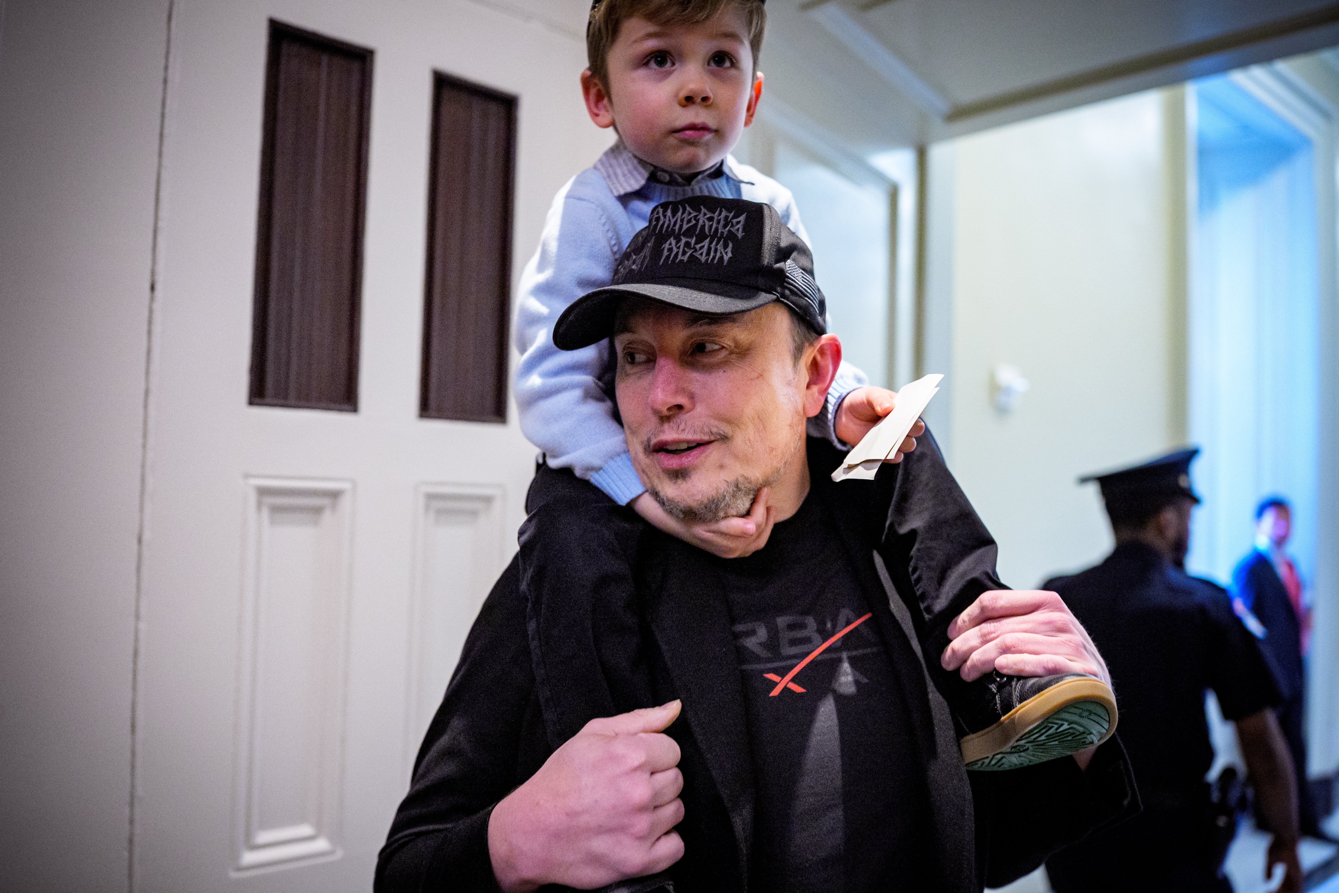 Elon Musk, with his son X Æ A-XII, arriving for a meeting with Senate Committee on Commerce, Science, and Transportation members at the U.S. Capitol Building on May 21, 2025 in Washington, DC
