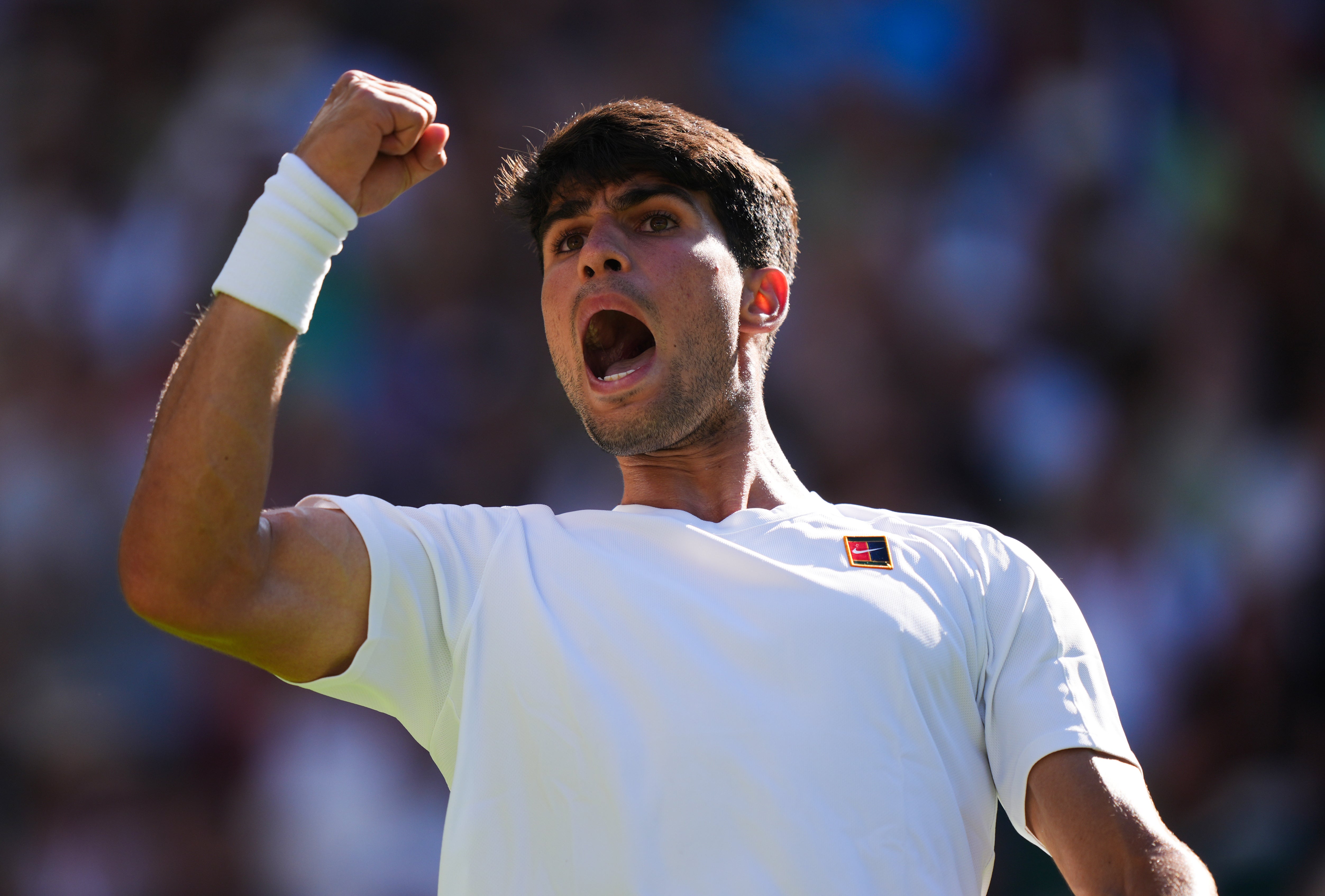 When is Carlos Alcaraz playing Oliver Tarvet at Wimbledon?
